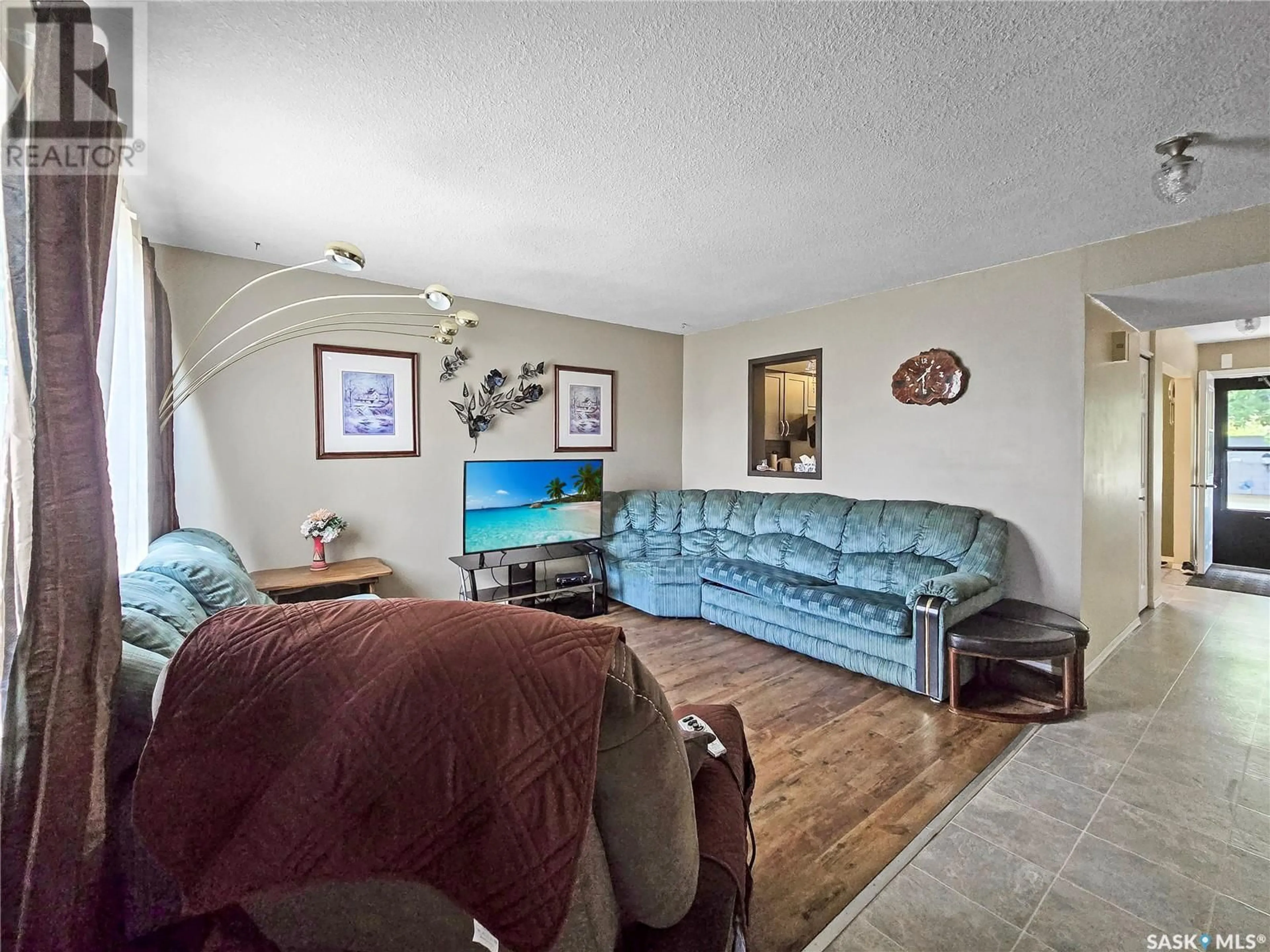 Living room with furniture, unknown for 13 CALWOOD CRESCENT, Yorkton Saskatchewan S3N2T5