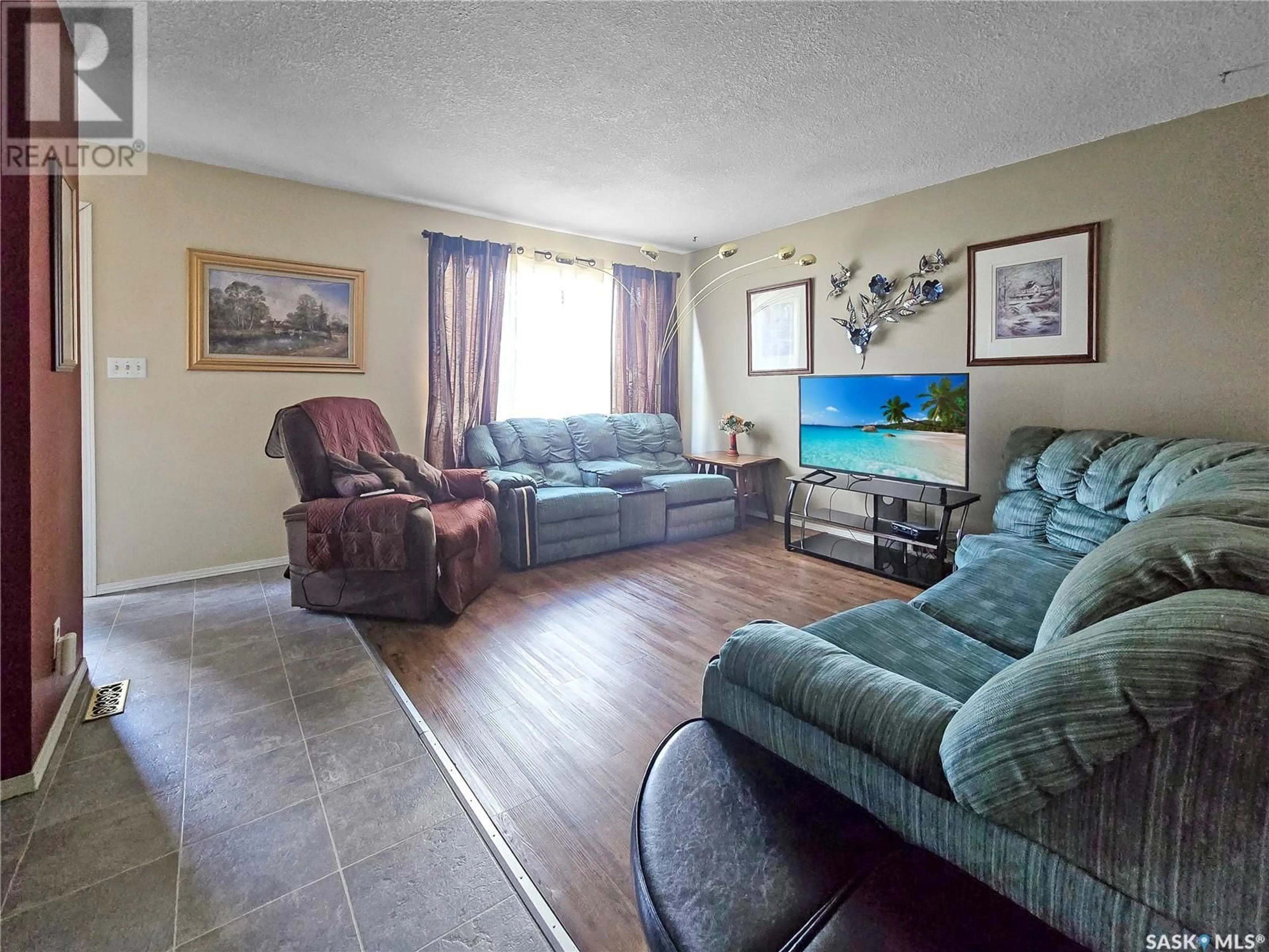 Living room with furniture, unknown for 13 CALWOOD CRESCENT, Yorkton Saskatchewan S3N2T5