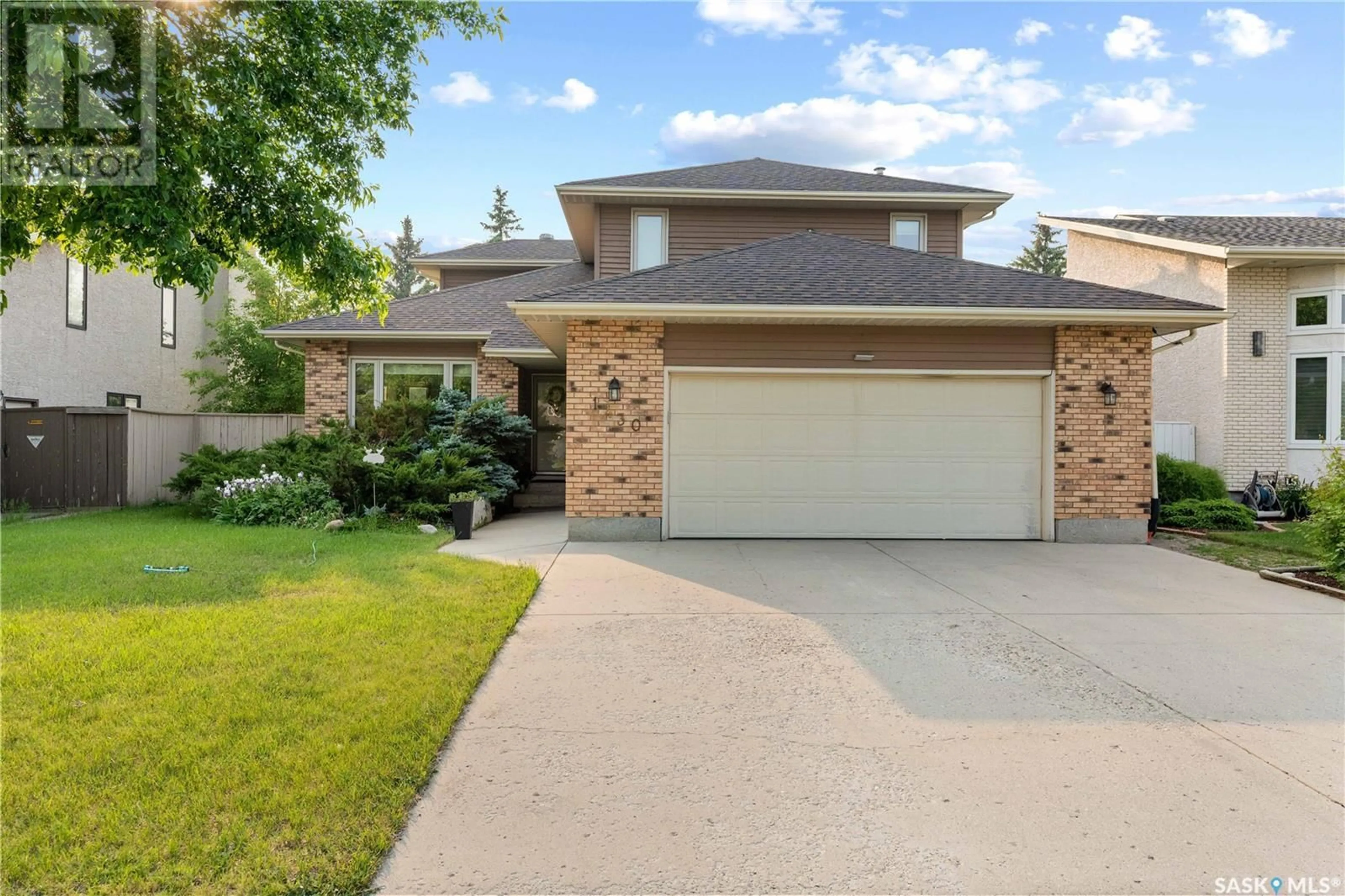 Home with brick exterior material, street for 1430 WASCANA HIGHLANDS, Regina Saskatchewan S4V2K2
