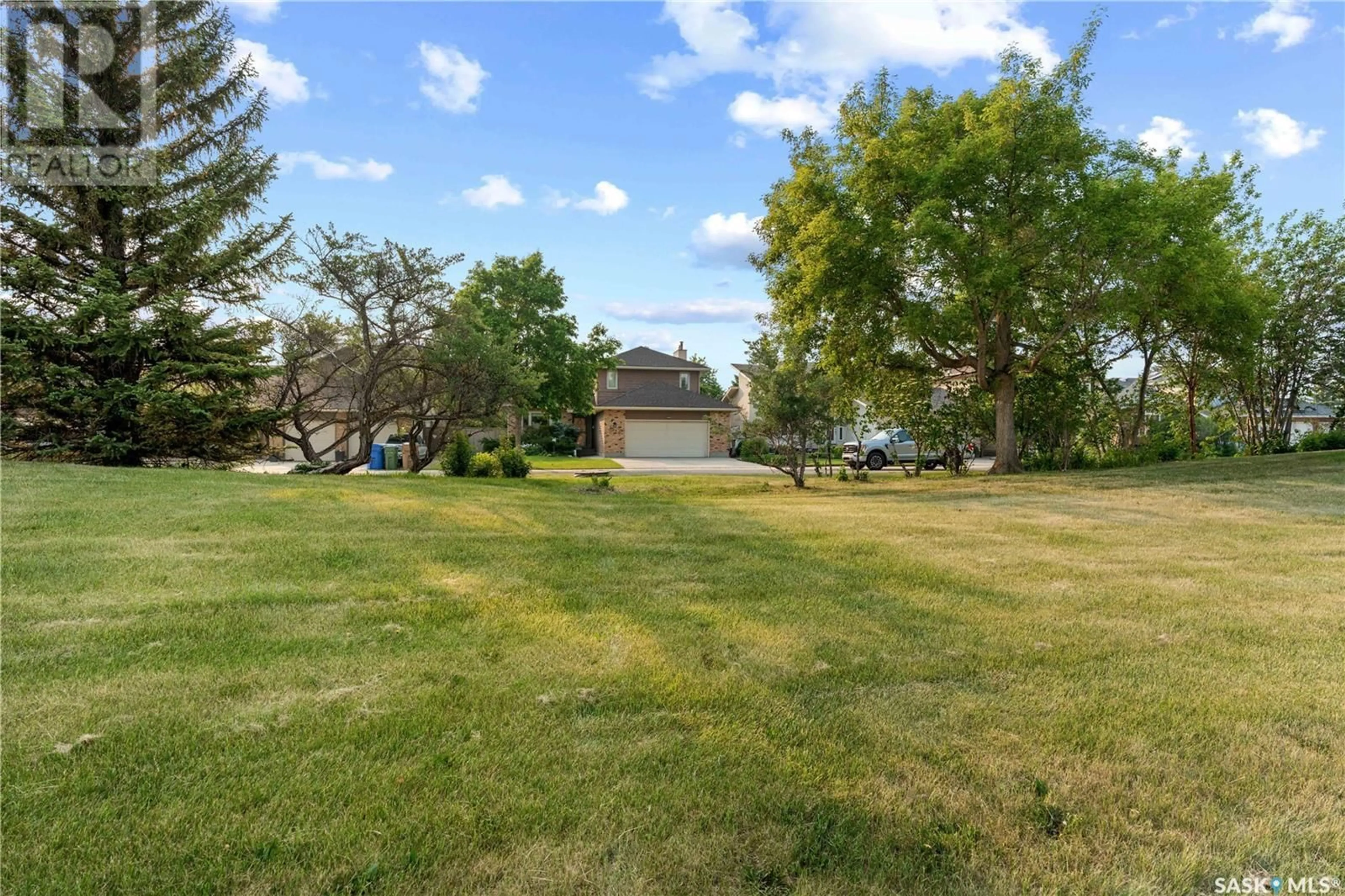 A pic from outside/outdoor area/front of a property/back of a property/a pic from drone, water/lake/river/ocean view for 1430 WASCANA HIGHLANDS, Regina Saskatchewan S4V2K2