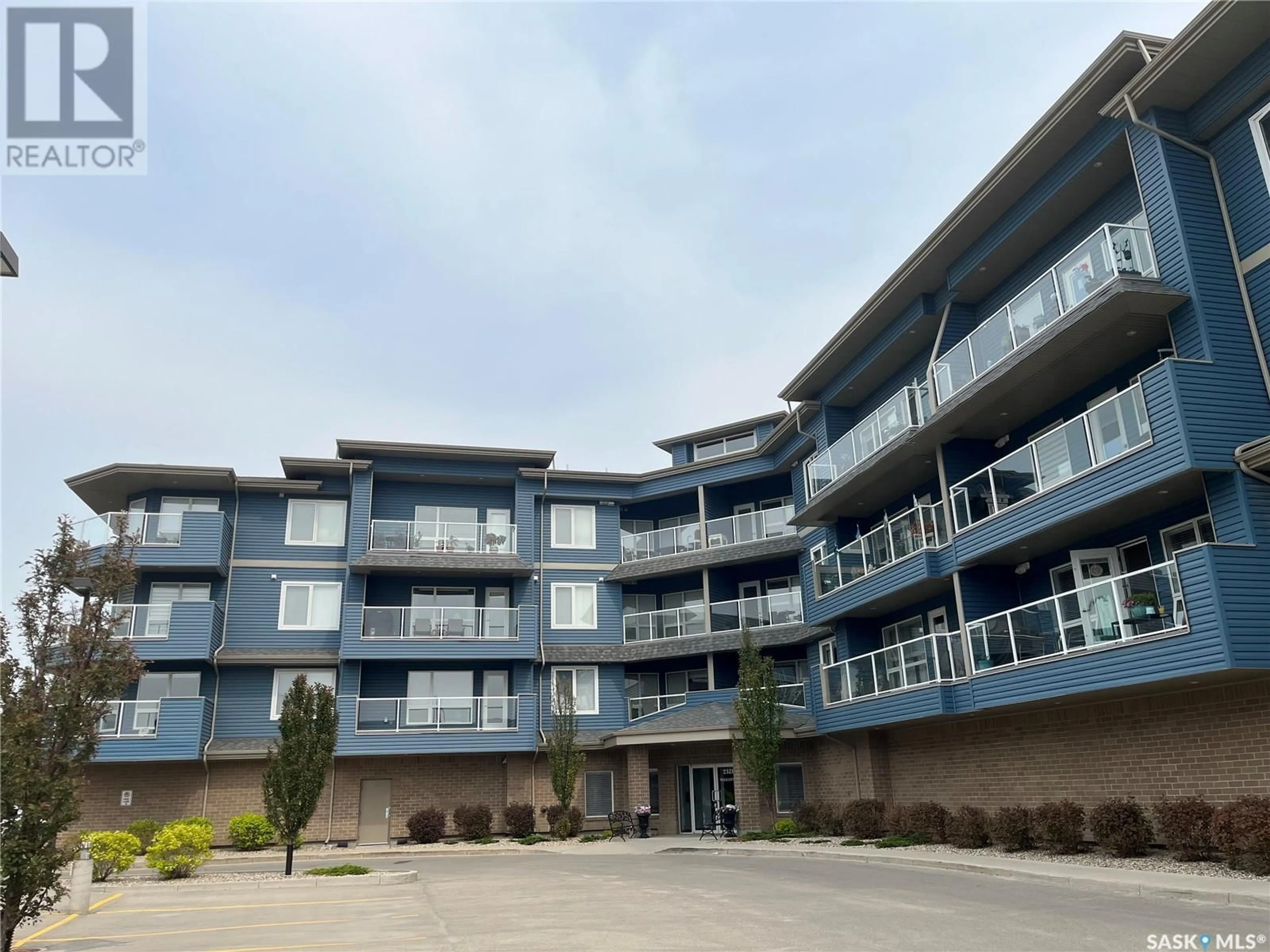 A pic from outside/outdoor area/front of a property/back of a property/a pic from drone, building for 210 - 2321 WINDSOR PARK ROAD, Regina Saskatchewan S4V3N2