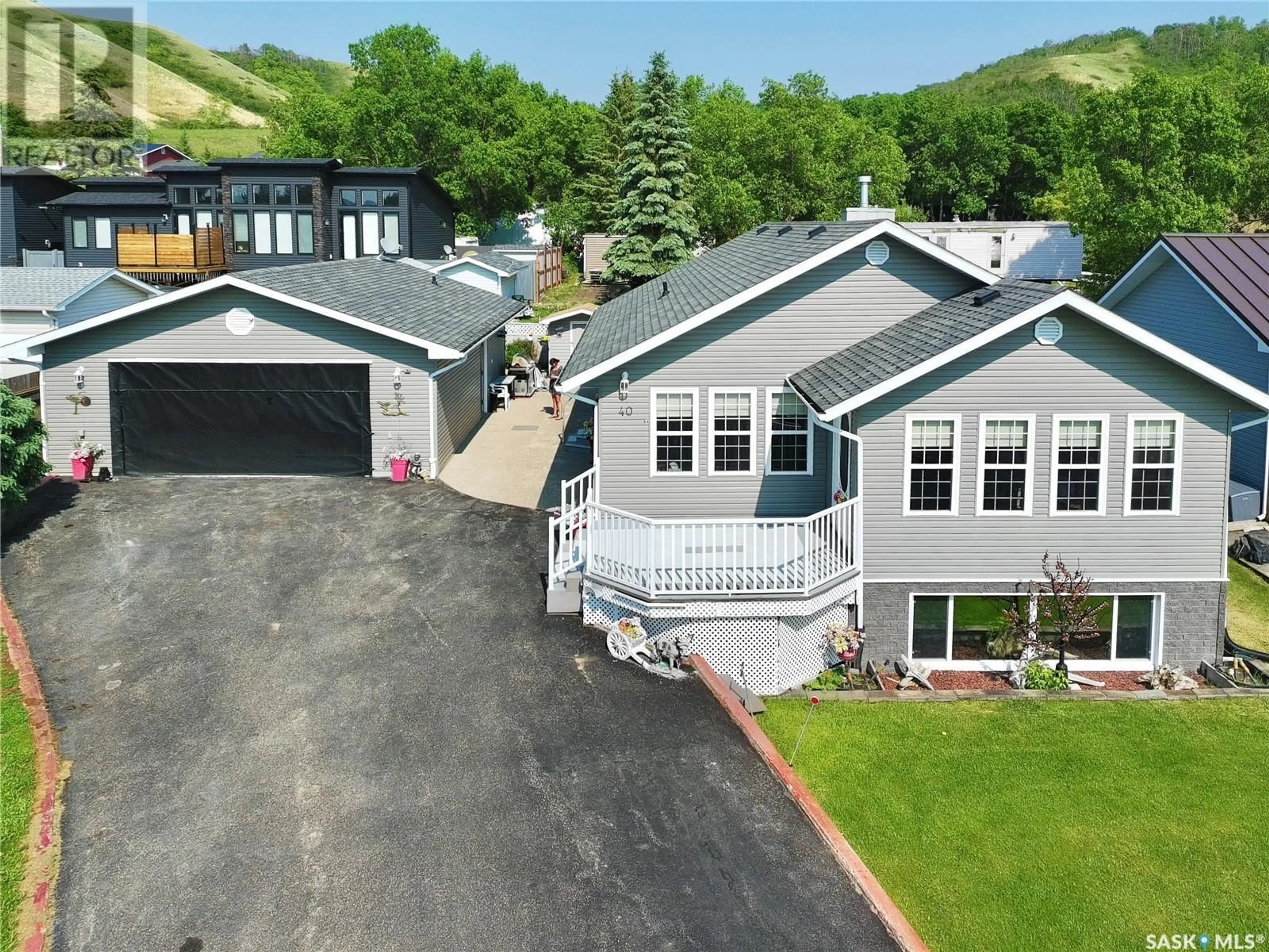 A pic from outside/outdoor area/front of a property/back of a property/a pic from drone, mountain view for 40 JACKSON STREET, Katepwa Beach Saskatchewan S0G1S0