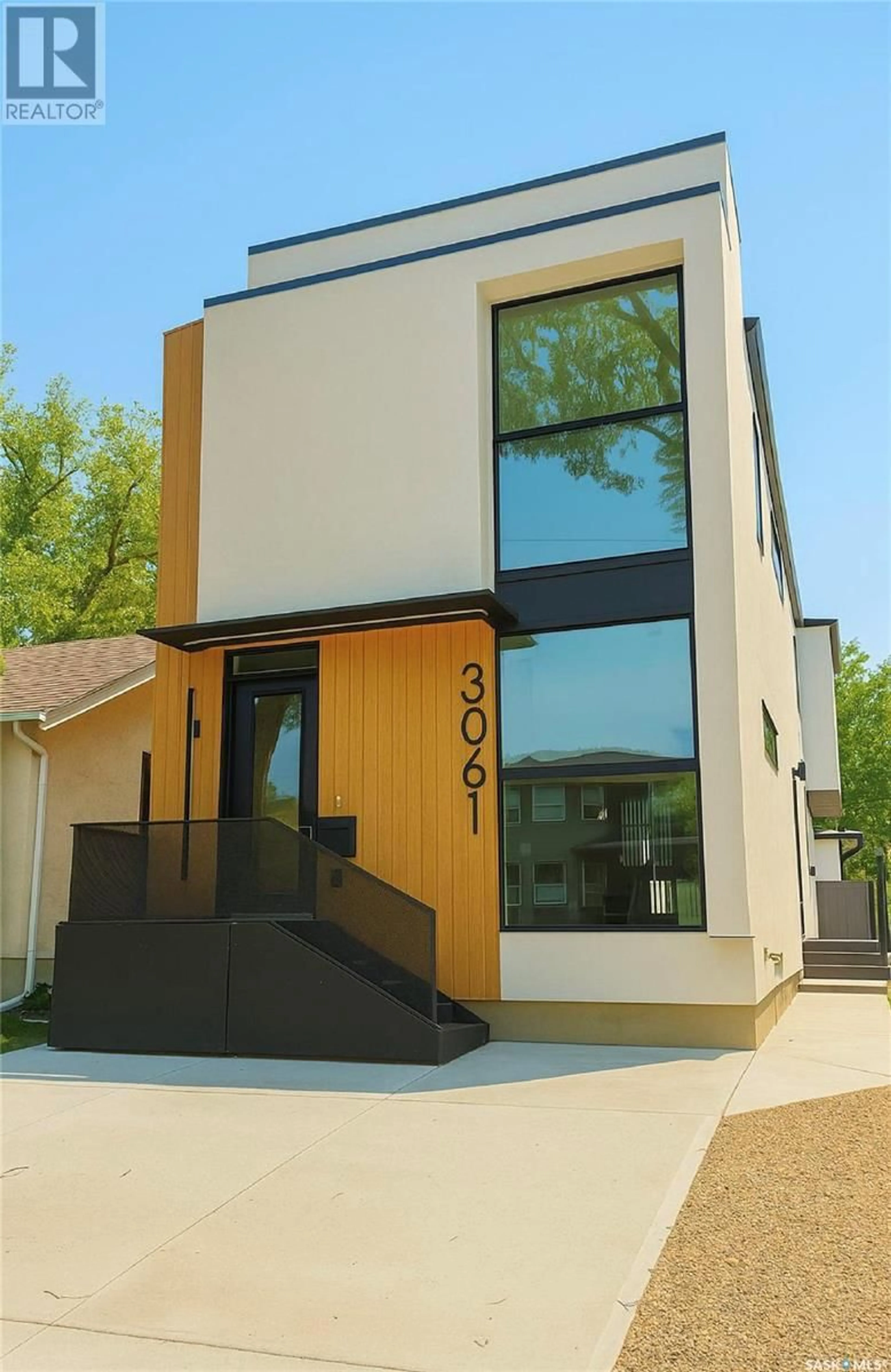 Home with vinyl exterior material, street for 3061 MONTAGUE STREET, Regina Saskatchewan S4S1Z6