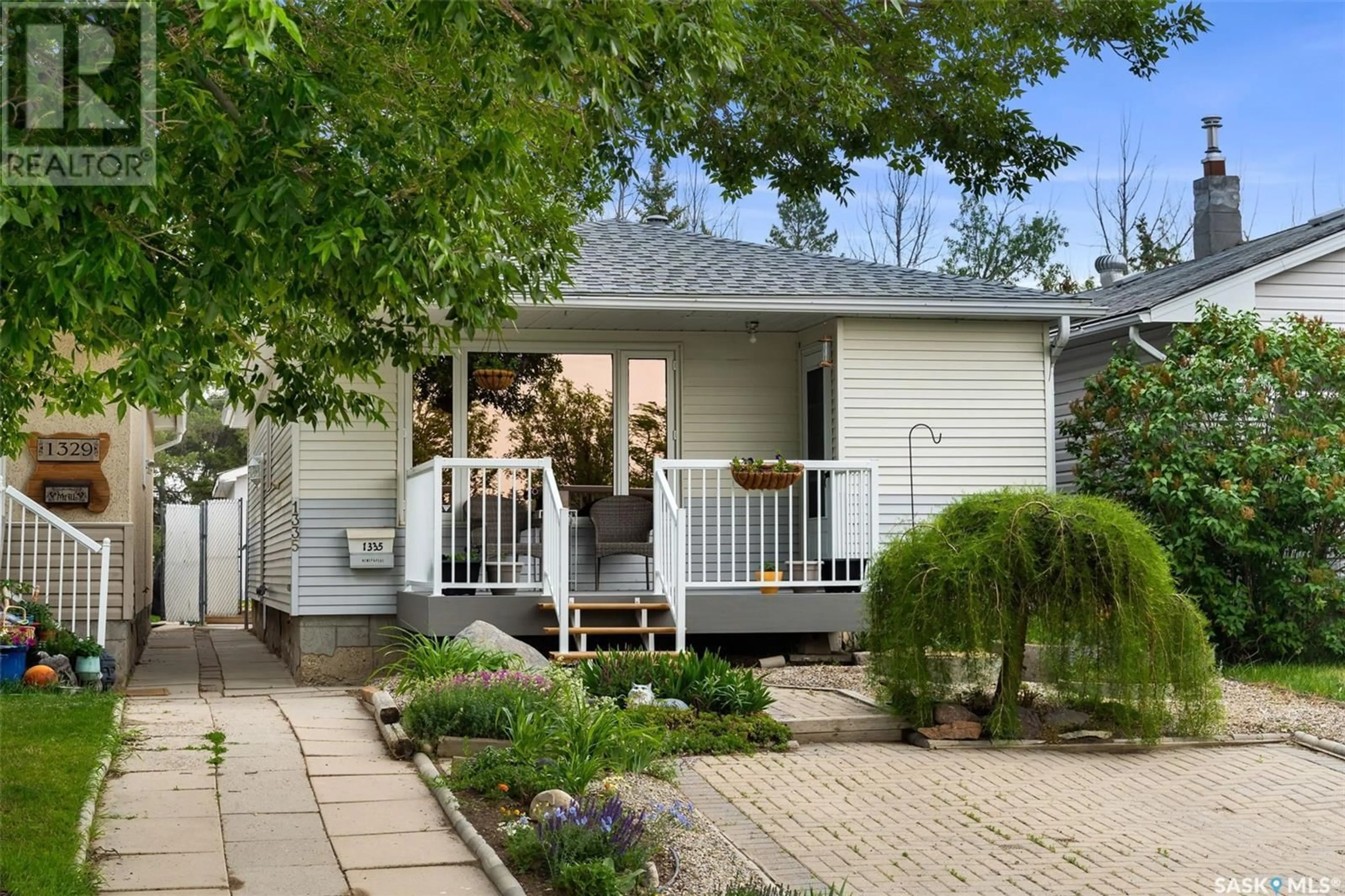 Home with vinyl exterior material, street for 1335 KENT STREET, Regina Saskatchewan S4T5T2