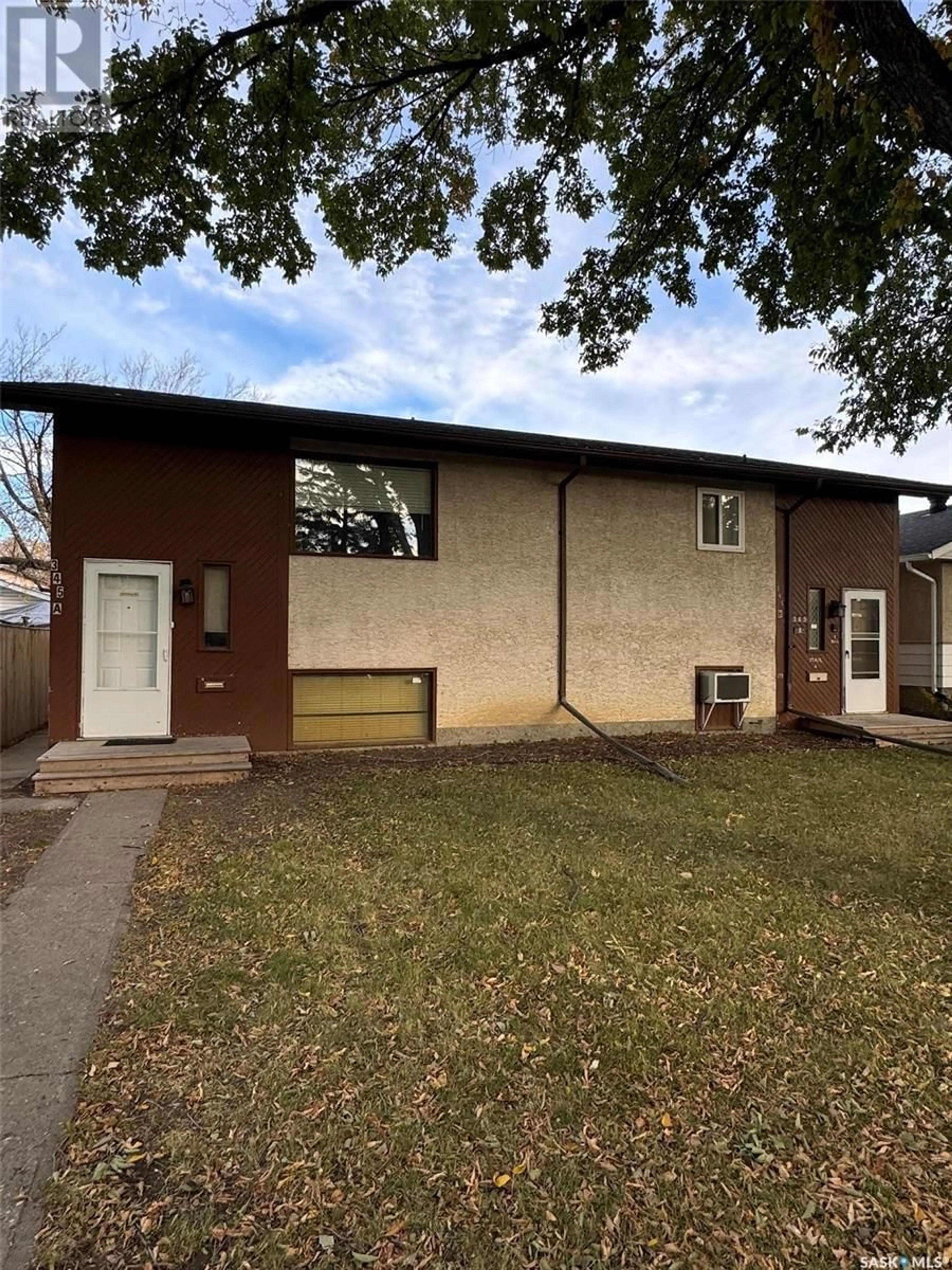 Home with vinyl exterior material, street for A & B - 345 SCARTH STREET, Regina Saskatchewan S4R2C4
