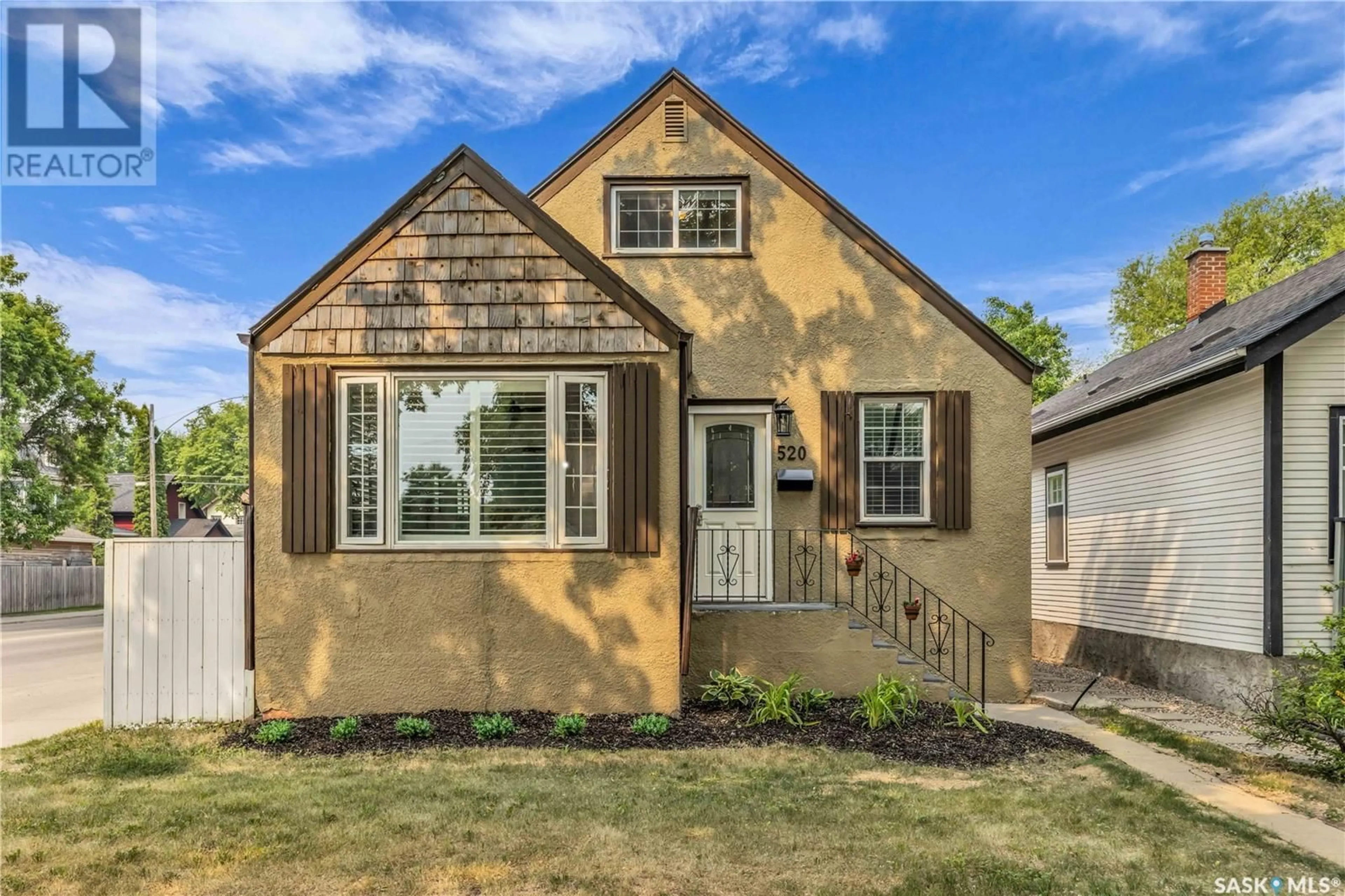 Home with vinyl exterior material, street for 520 LANSDOWNE AVENUE, Saskatoon Saskatchewan S7N1E1