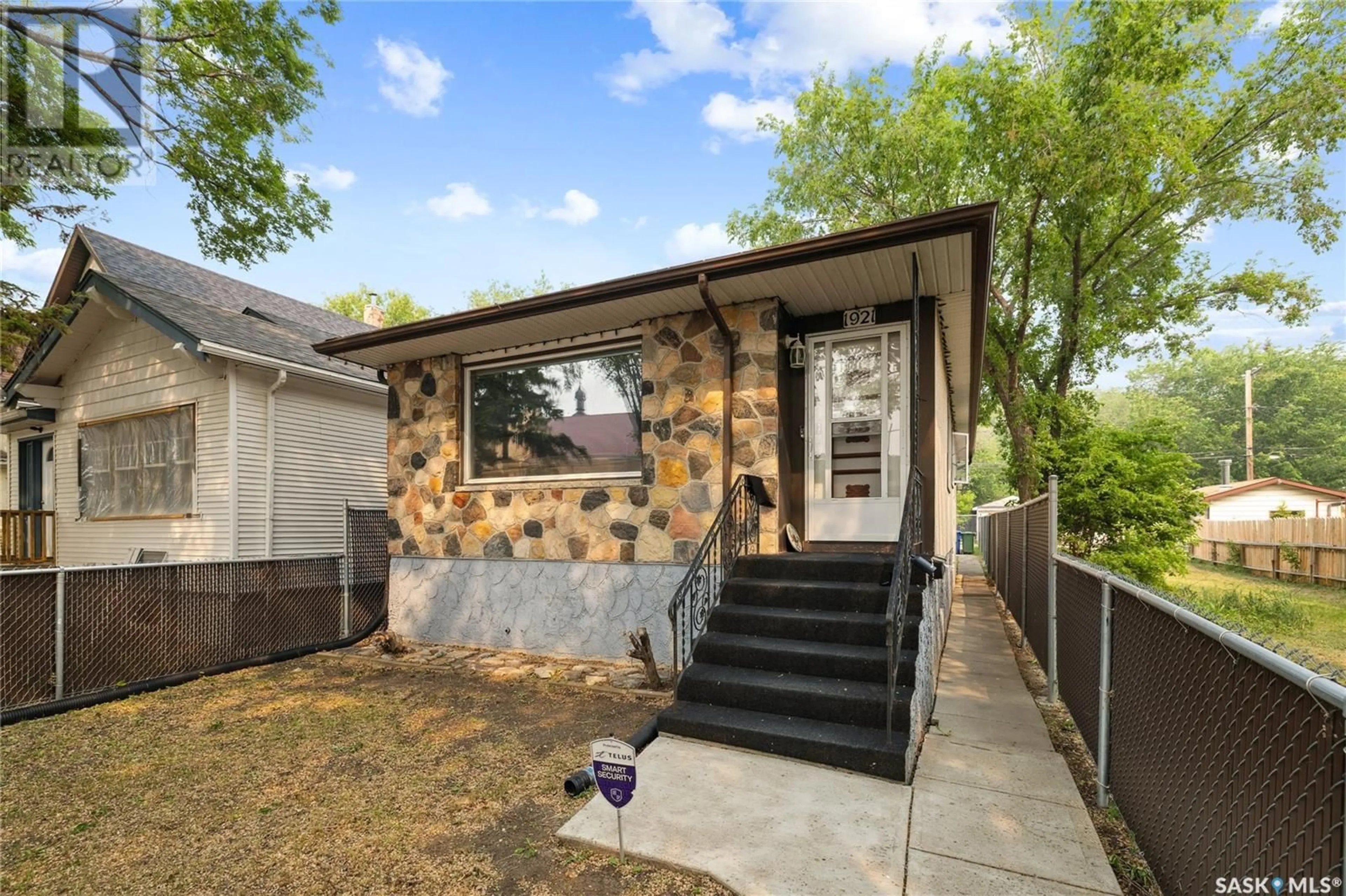 Home with brick exterior material, street for 1921 TORONTO STREET, Regina Saskatchewan S4P1M9
