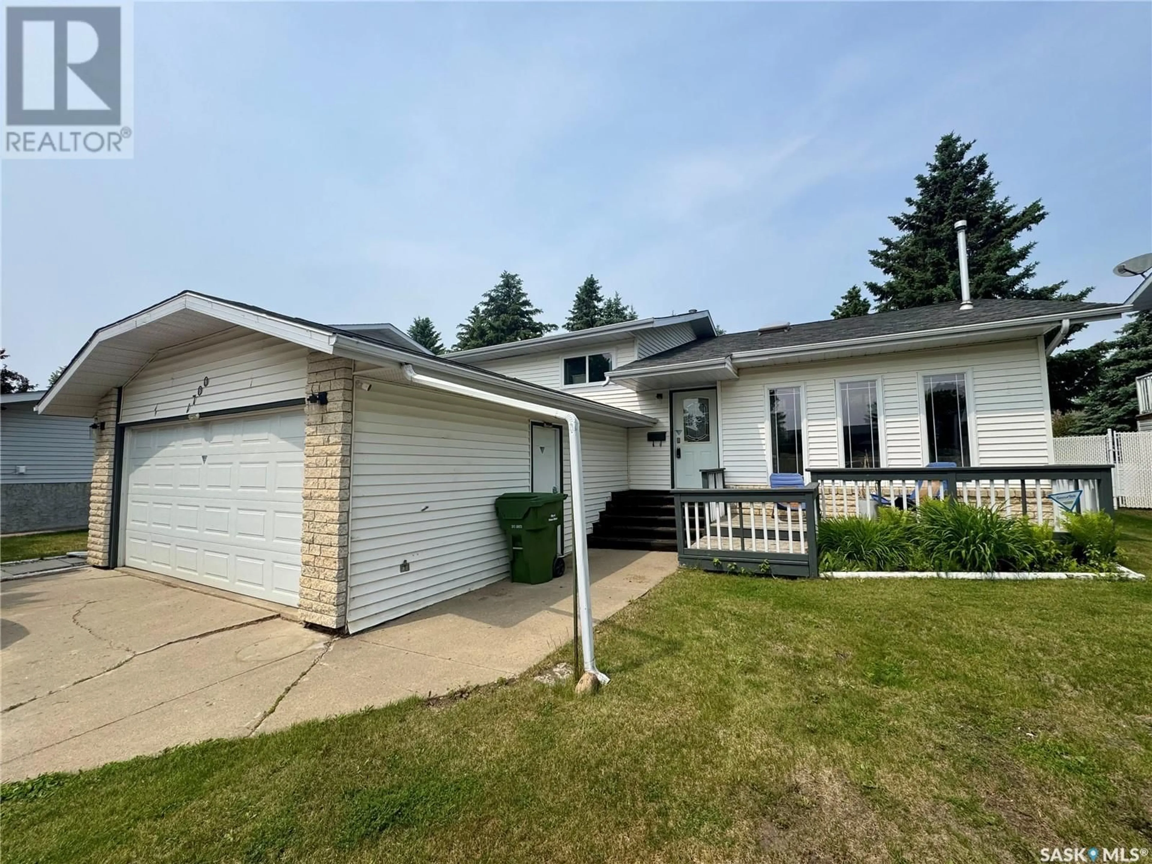 Home with vinyl exterior material, street for 1700 BARTON DRIVE, Prince Albert Saskatchewan S6V7W3
