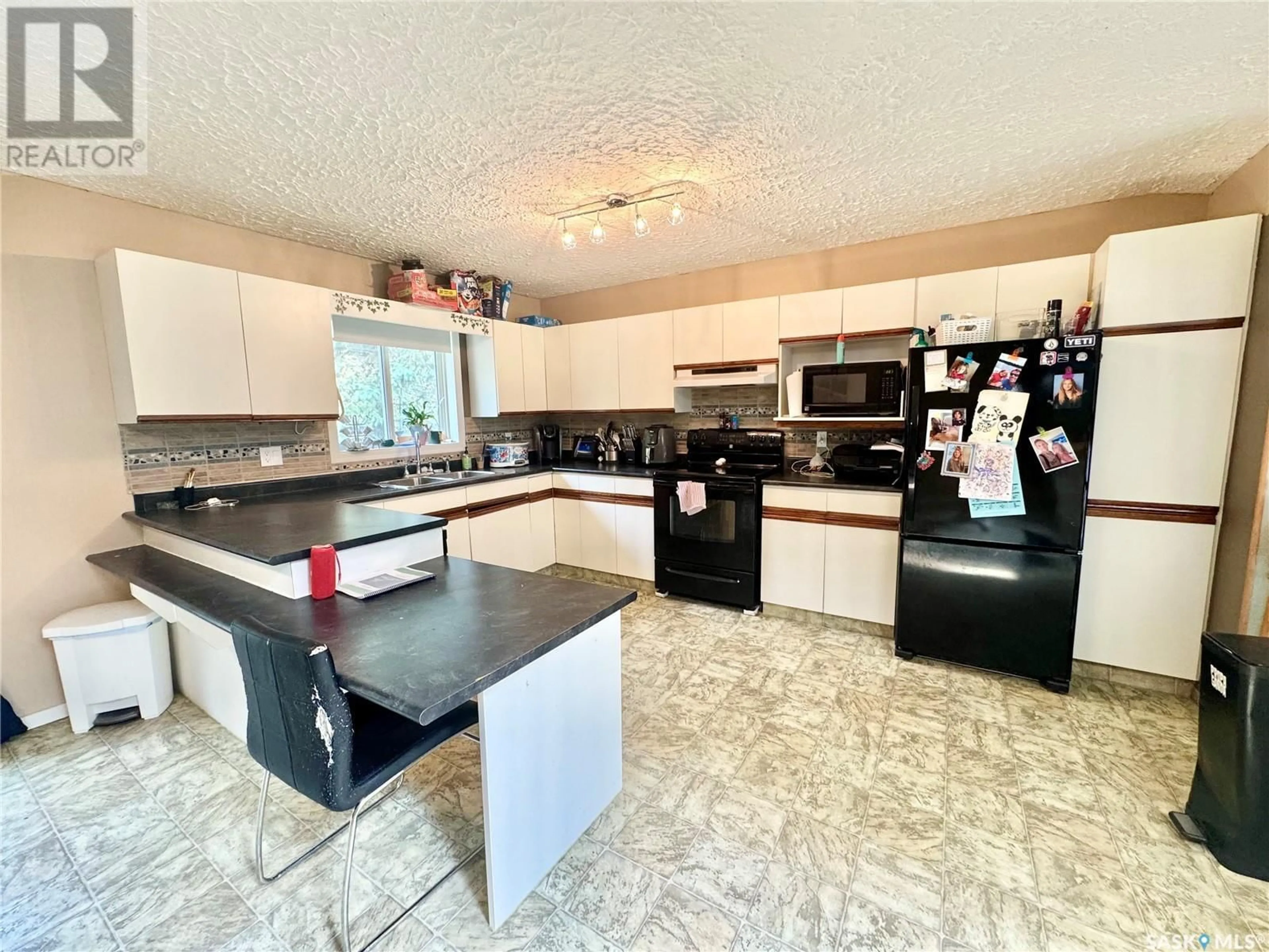 Open concept kitchen, ceramic/tile floor for 1700 BARTON DRIVE, Prince Albert Saskatchewan S6V7W3