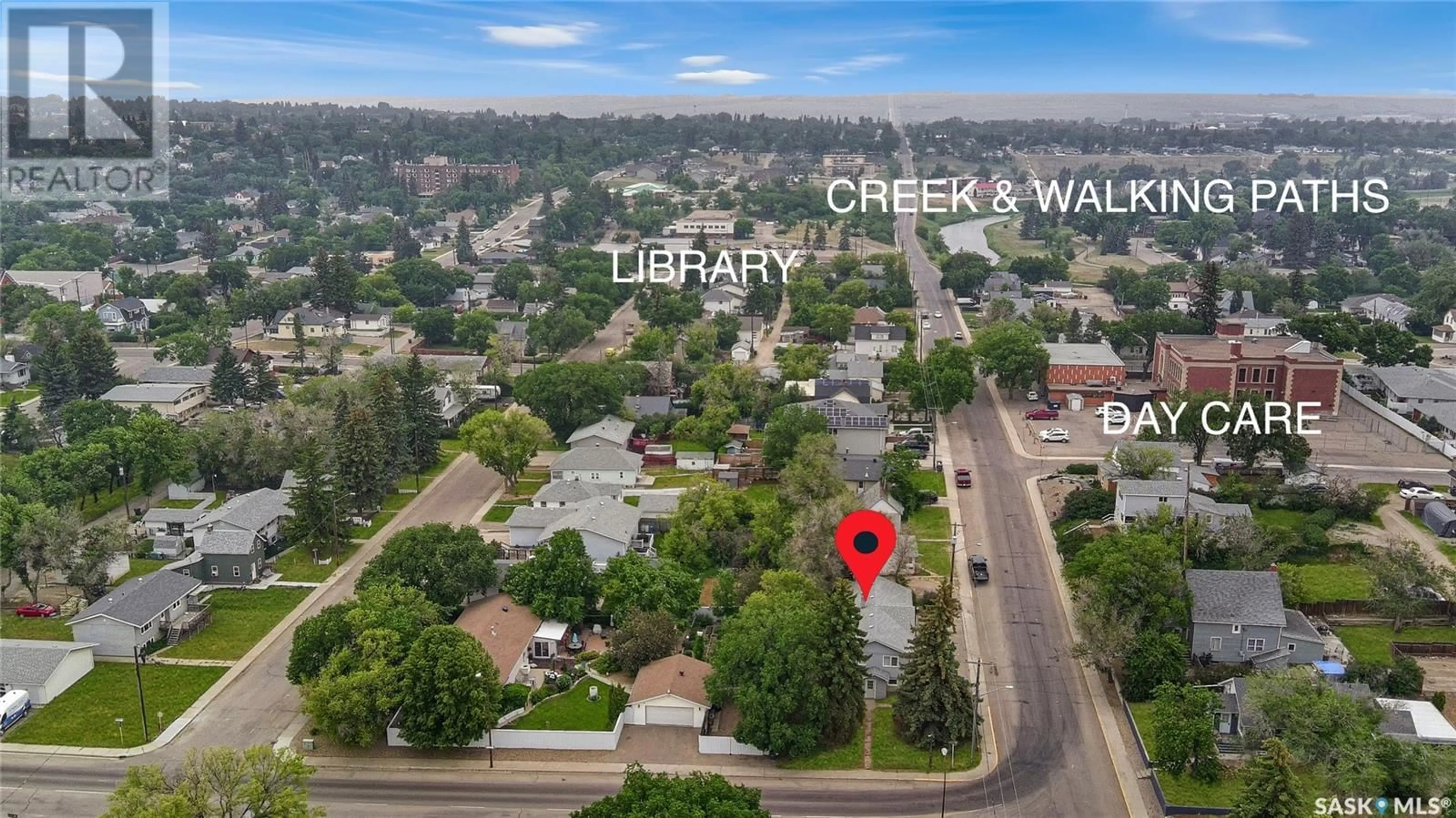 A pic from outside/outdoor area/front of a property/back of a property/a pic from drone, street for 104 6TH AVENUE, Swift Current Saskatchewan S9H2M1