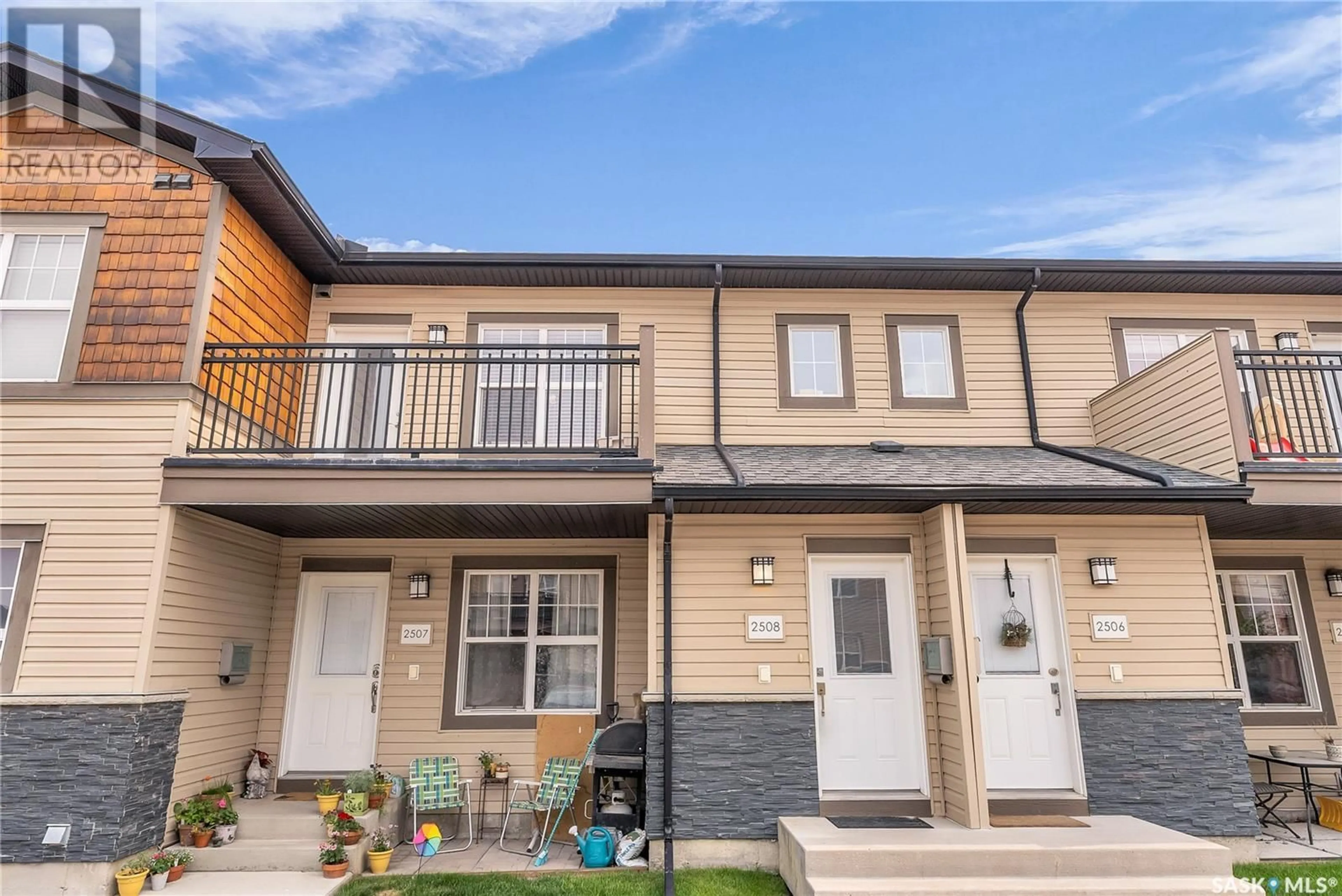 Home with vinyl exterior material, street for 1015 - 2508 PATRICK CRESCENT, Saskatoon Saskatchewan S7W0M1