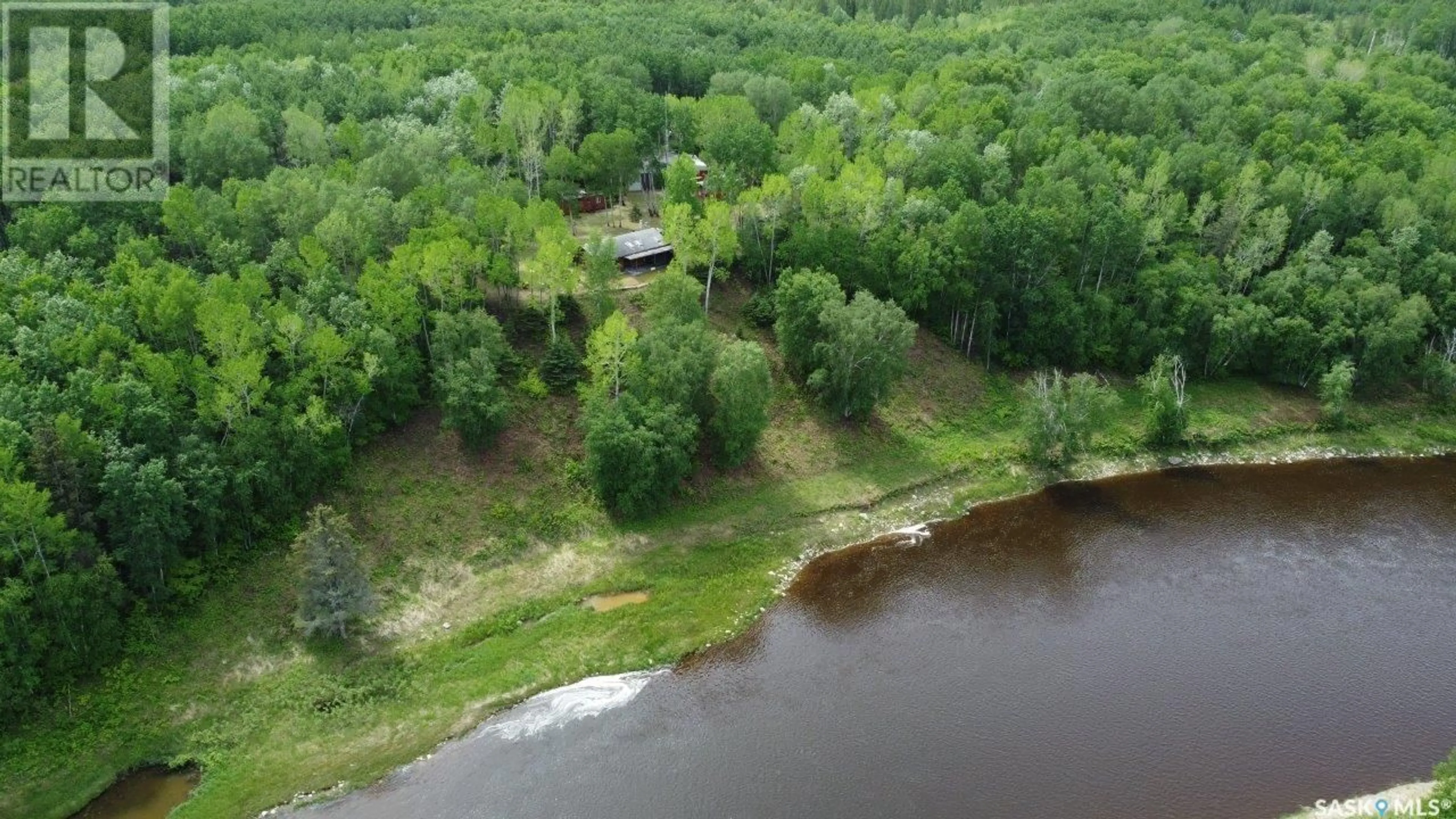 A pic from outside/outdoor area/front of a property/back of a property/a pic from drone, water/lake/river/ocean view for .76 NORTHEAST LEASE, Hudson Bay Rm No. 394 Saskatchewan S0E0Y0