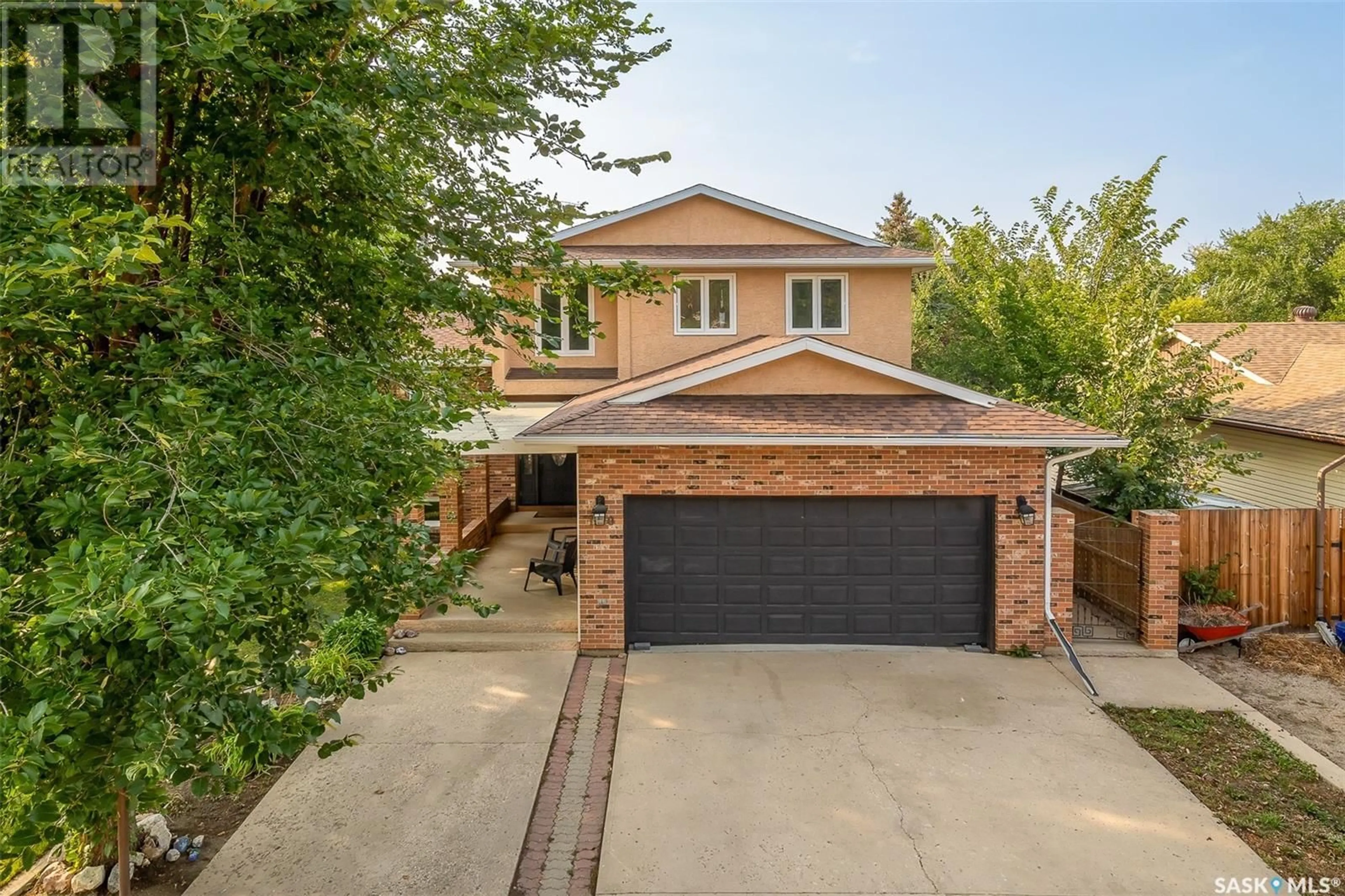 Home with brick exterior material, street for 1330 REGAL CRESCENT, Moose Jaw Saskatchewan S6H7S2