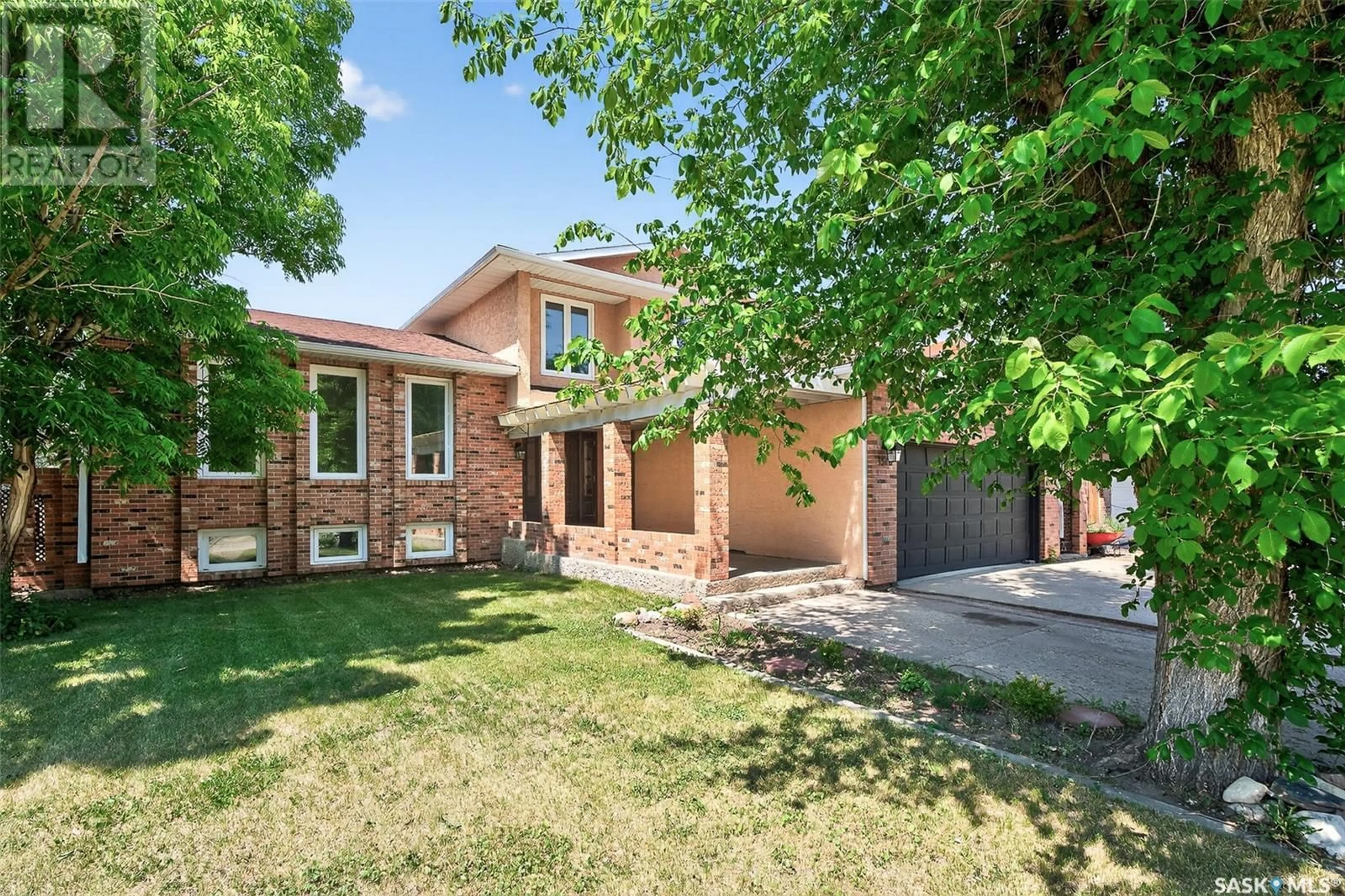 Home with brick exterior material, street for 1330 REGAL CRESCENT, Moose Jaw Saskatchewan S6H7S2