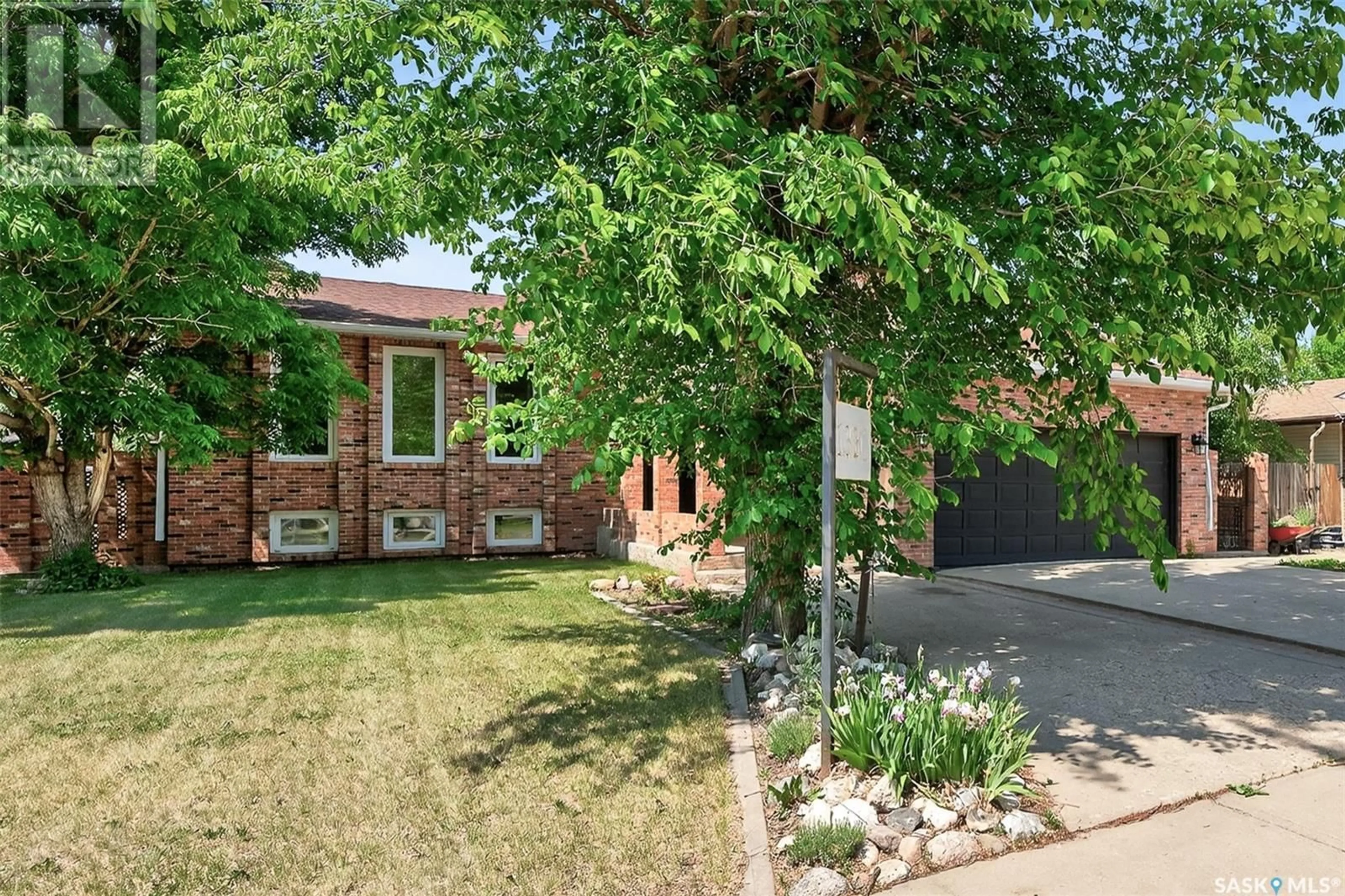 Home with brick exterior material, street for 1330 REGAL CRESCENT, Moose Jaw Saskatchewan S6H7S2