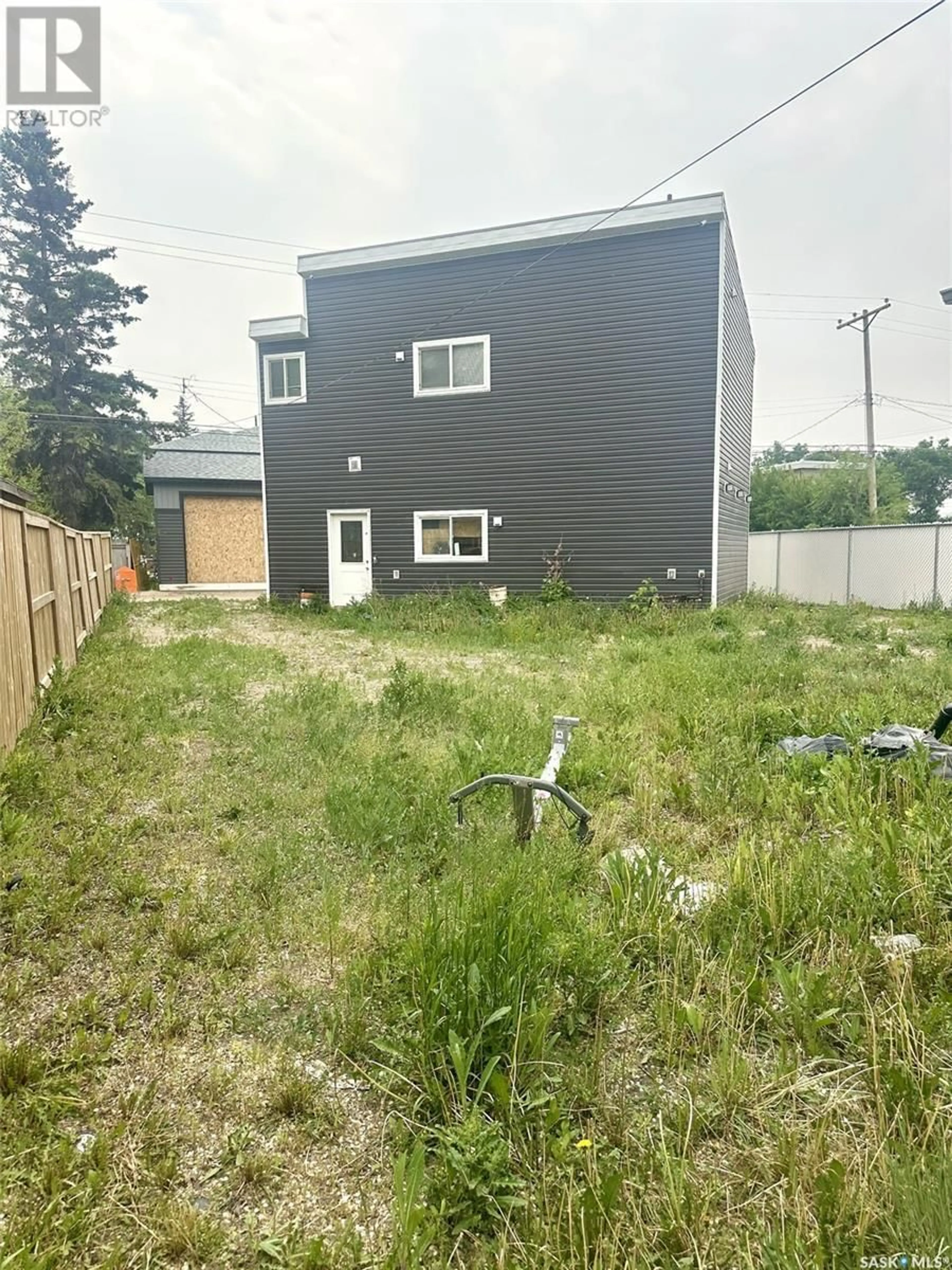 A pic from outside/outdoor area/front of a property/back of a property/a pic from drone, street for 413 109TH STREET, Saskatoon Saskatchewan S7N1R8