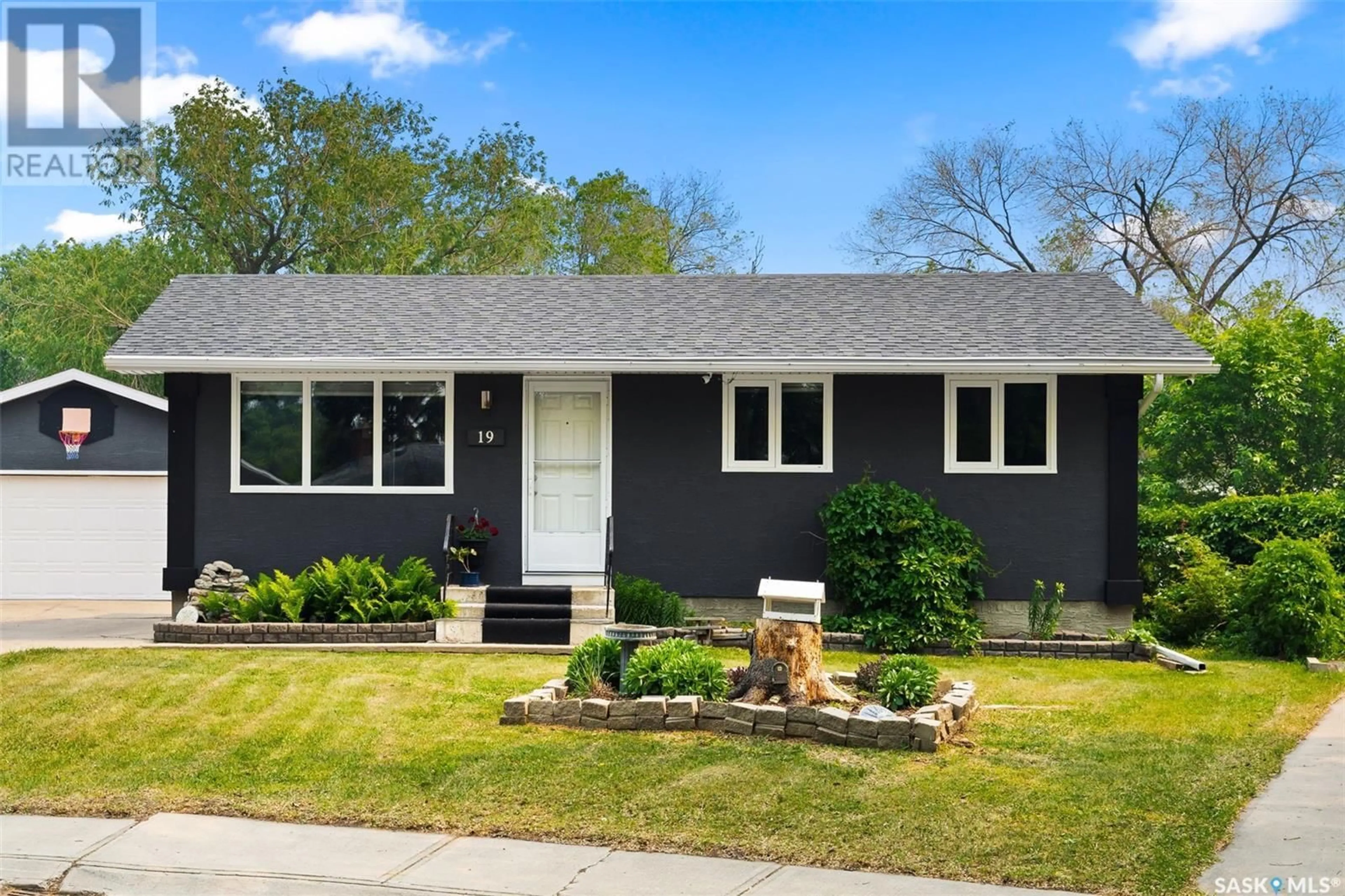 Home with vinyl exterior material, street for 19 LE JEUNE PLACE, Regina Saskatchewan S4T6K2