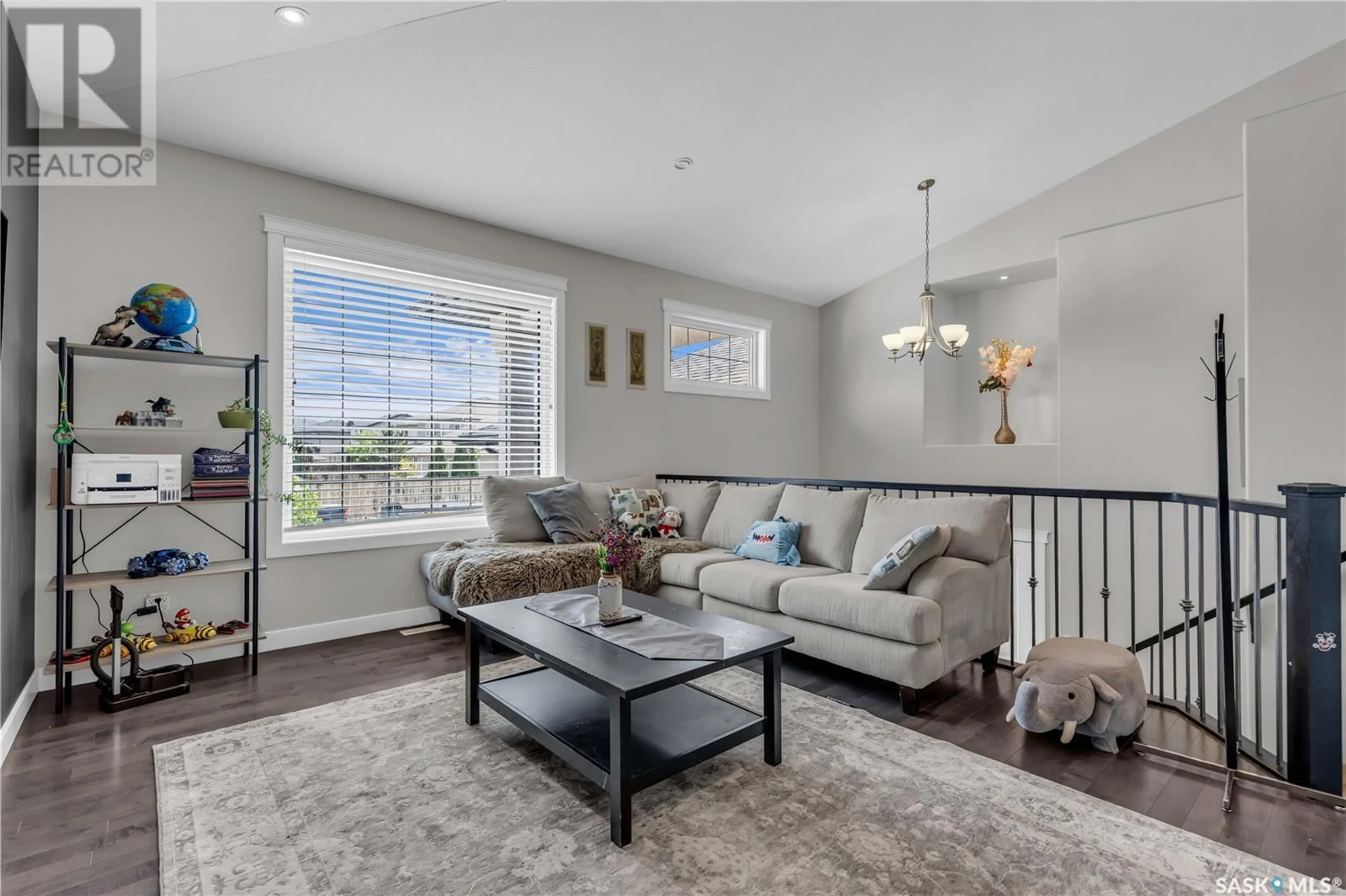 Living room with furniture, unknown for 311 WATERS CRESCENT, Saskatoon Saskatchewan S7W0A5