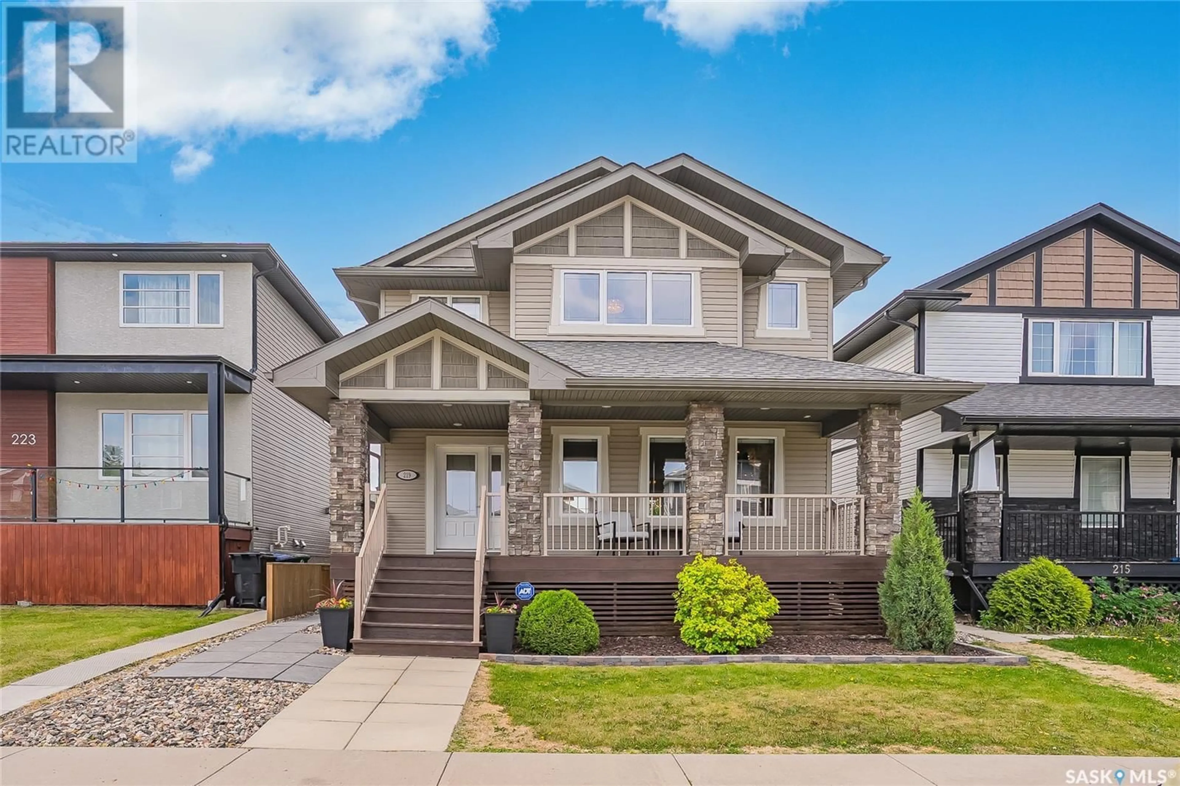 Home with vinyl exterior material, street for 219 WYANT LANE, Saskatoon Saskatchewan S7W0L2