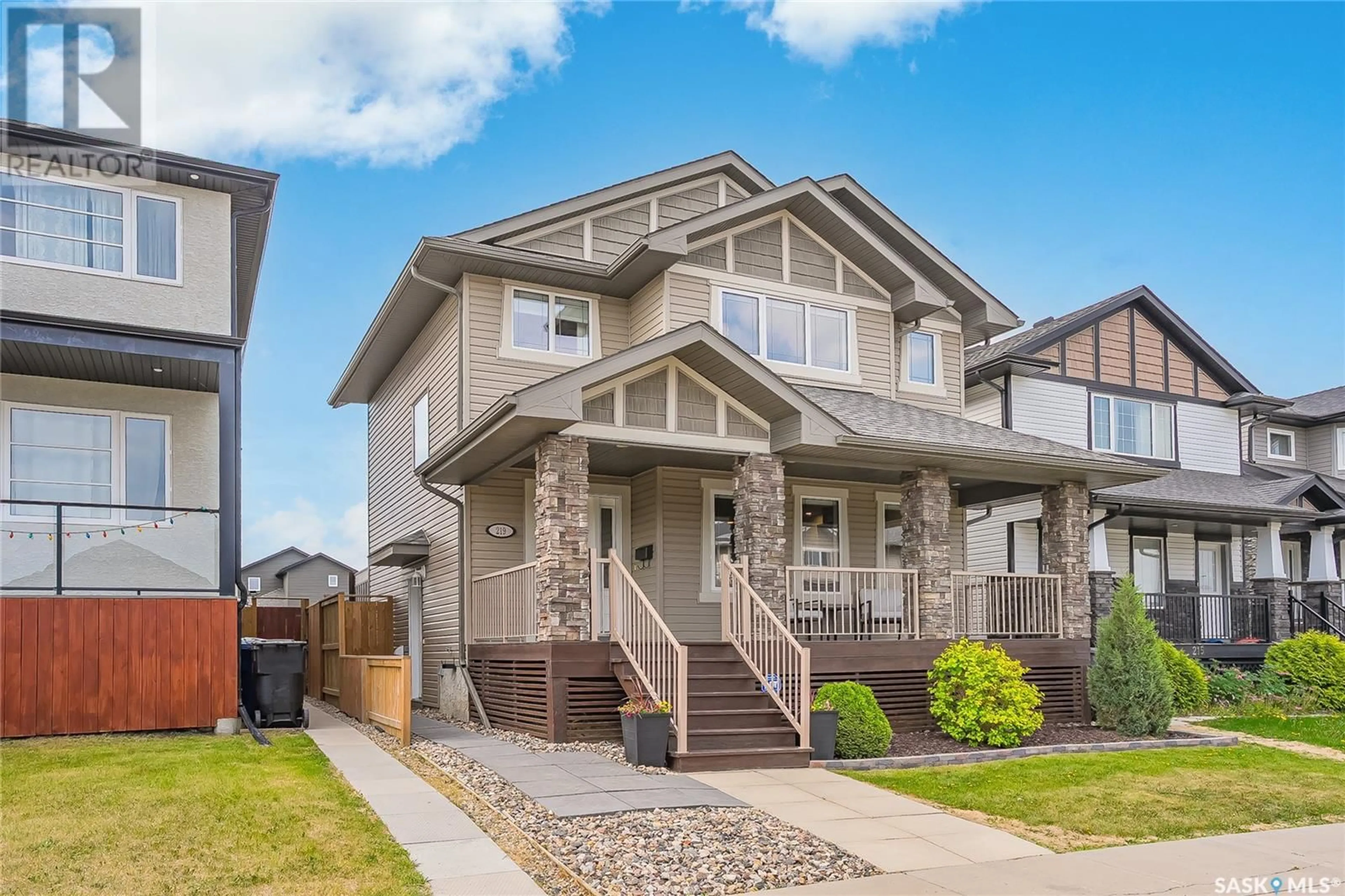 Home with vinyl exterior material, street for 219 WYANT LANE, Saskatoon Saskatchewan S7W0L2
