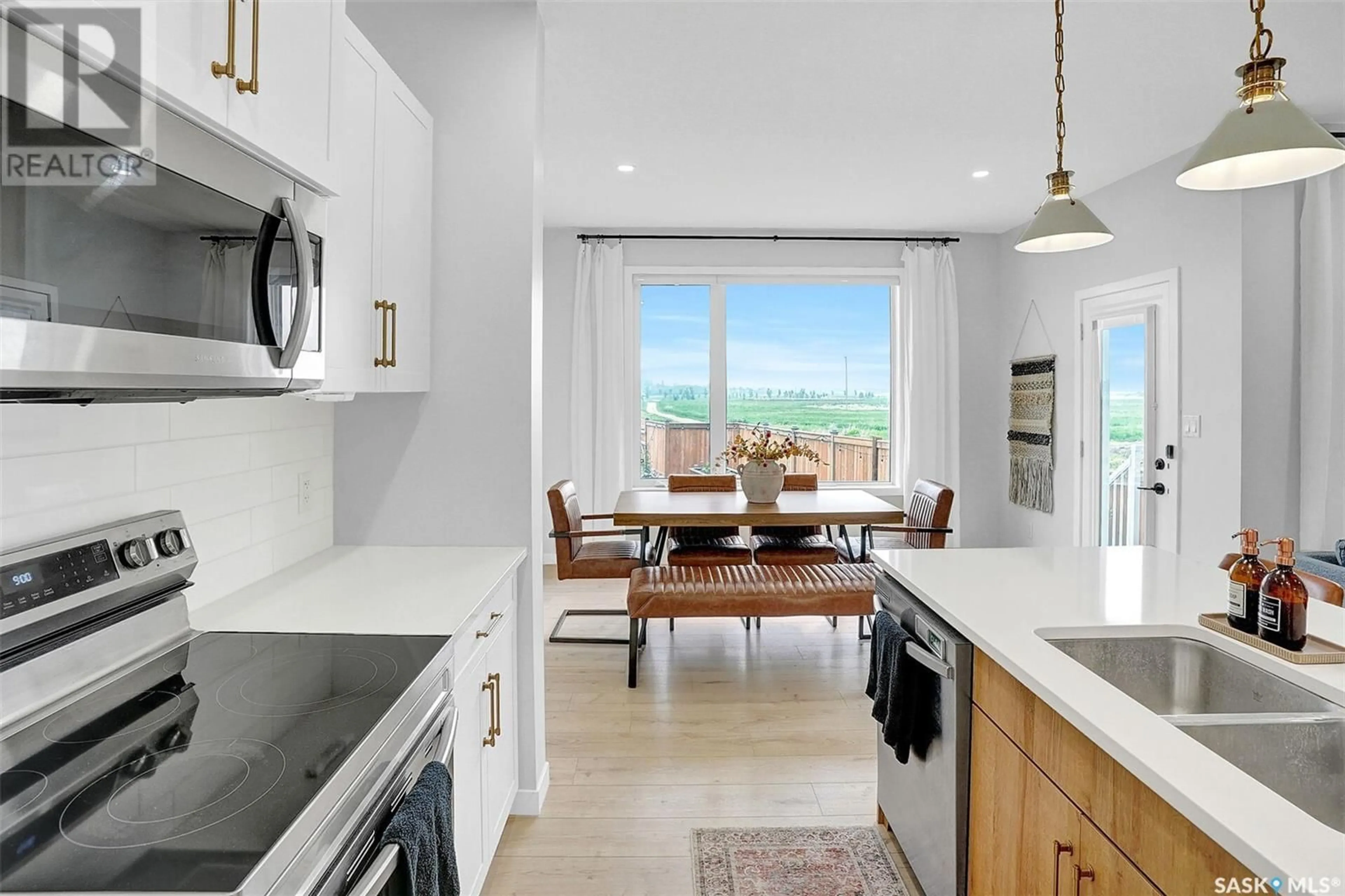 Open concept kitchen, ceramic/tile floor for 7900 BARLEY CRESCENT, Regina Saskatchewan S4Y0E6