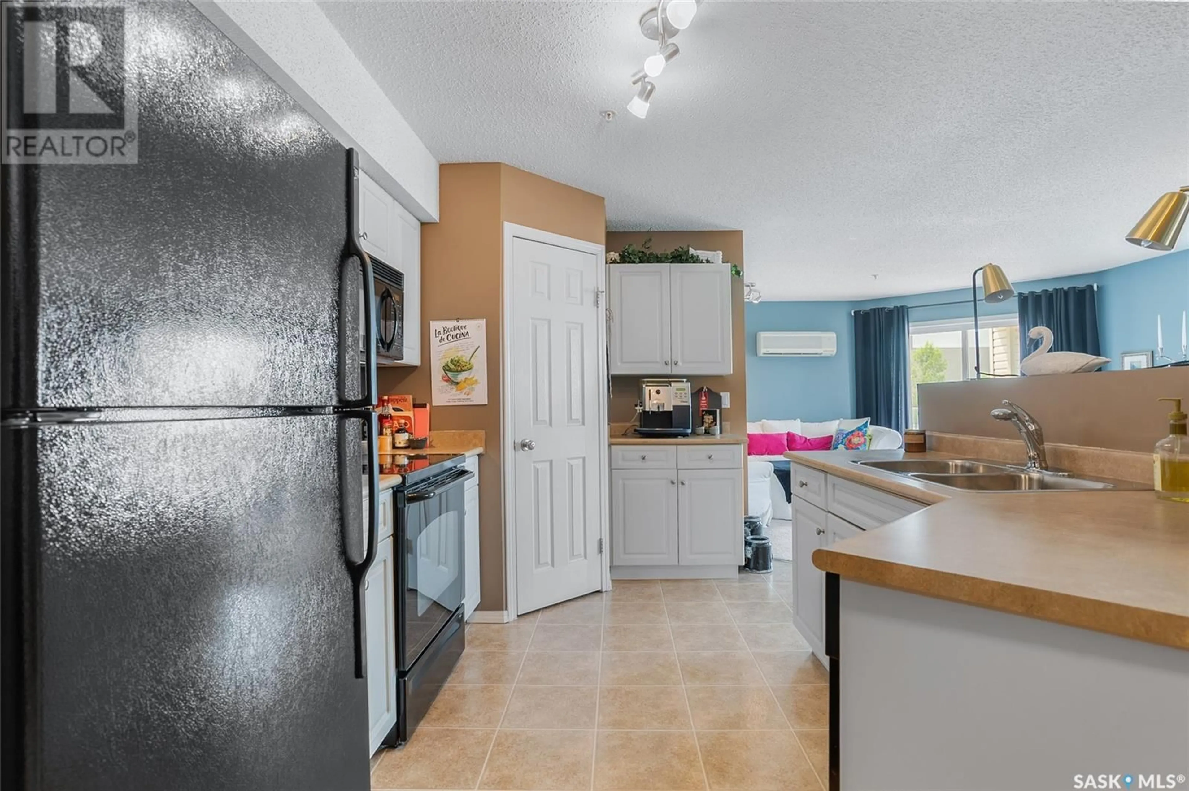 Standard kitchen, ceramic/tile floor for 303 - 215 LOWE ROAD, Saskatoon Saskatchewan S7S1P2