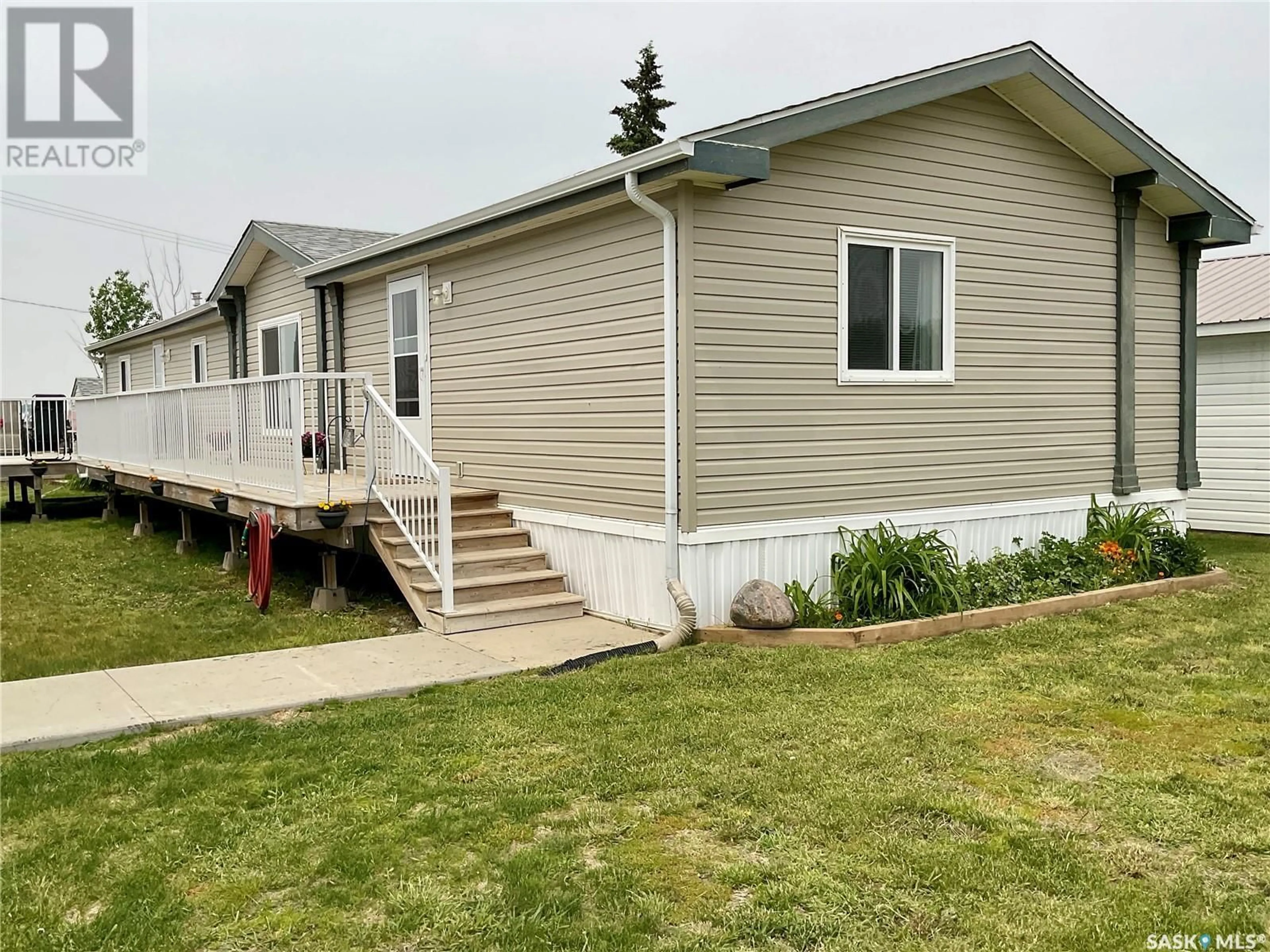 Home with vinyl exterior material, street for 62 MAIN STREET, Lajord Rm No. 128 Saskatchewan S0G2T0