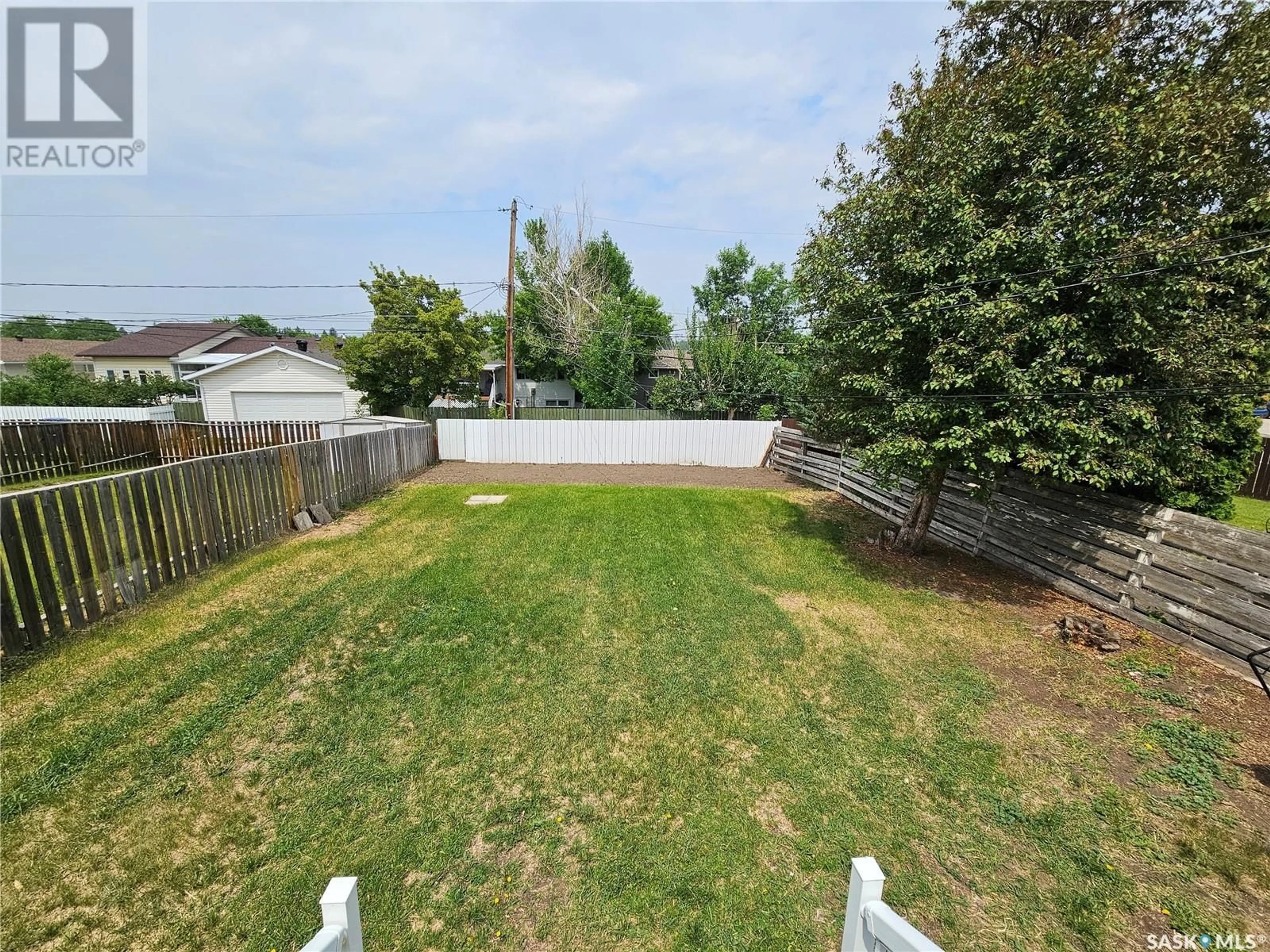 A pic from outside/outdoor area/front of a property/back of a property/a pic from drone, unknown for 922 SIMCOE STREET, Moose Jaw Saskatchewan S6H3H9