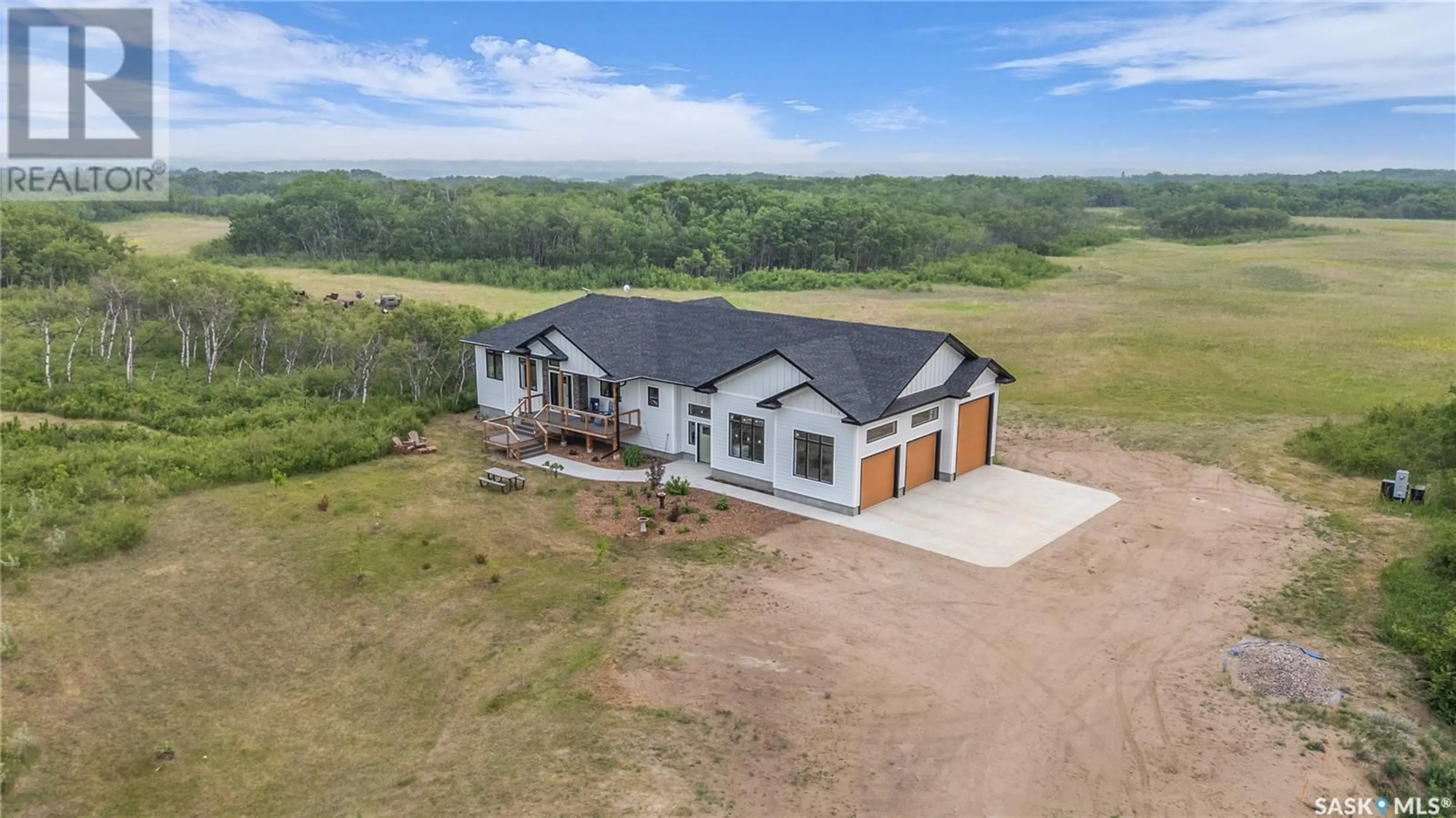 A pic from outside/outdoor area/front of a property/back of a property/a pic from drone, building for WESTON ACREAGE, Corman Park Rm No. 344 Saskatchewan S7K3J6