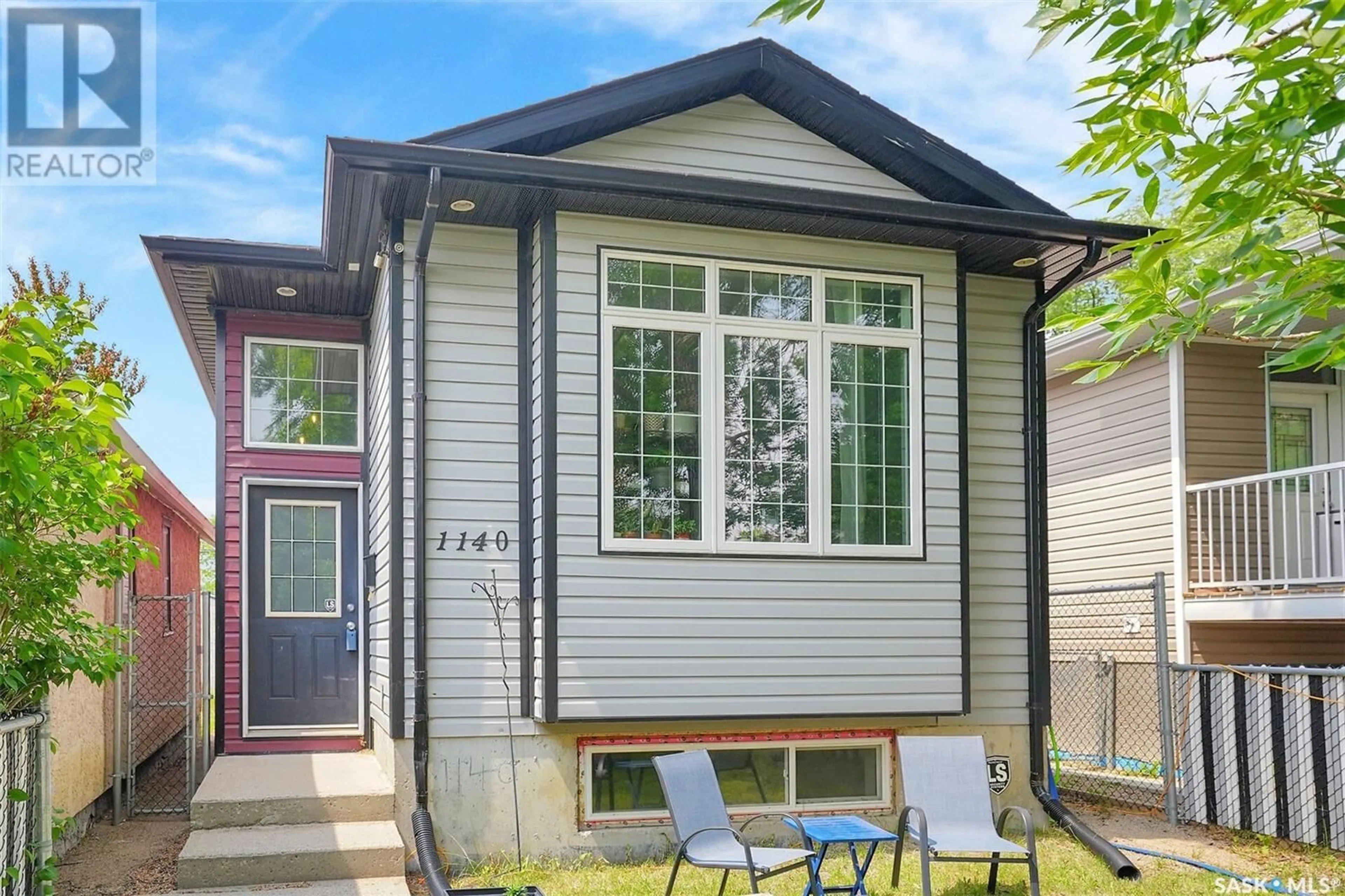Home with vinyl exterior material, street for 1140 BRODER STREET, Regina Saskatchewan S4N3P9