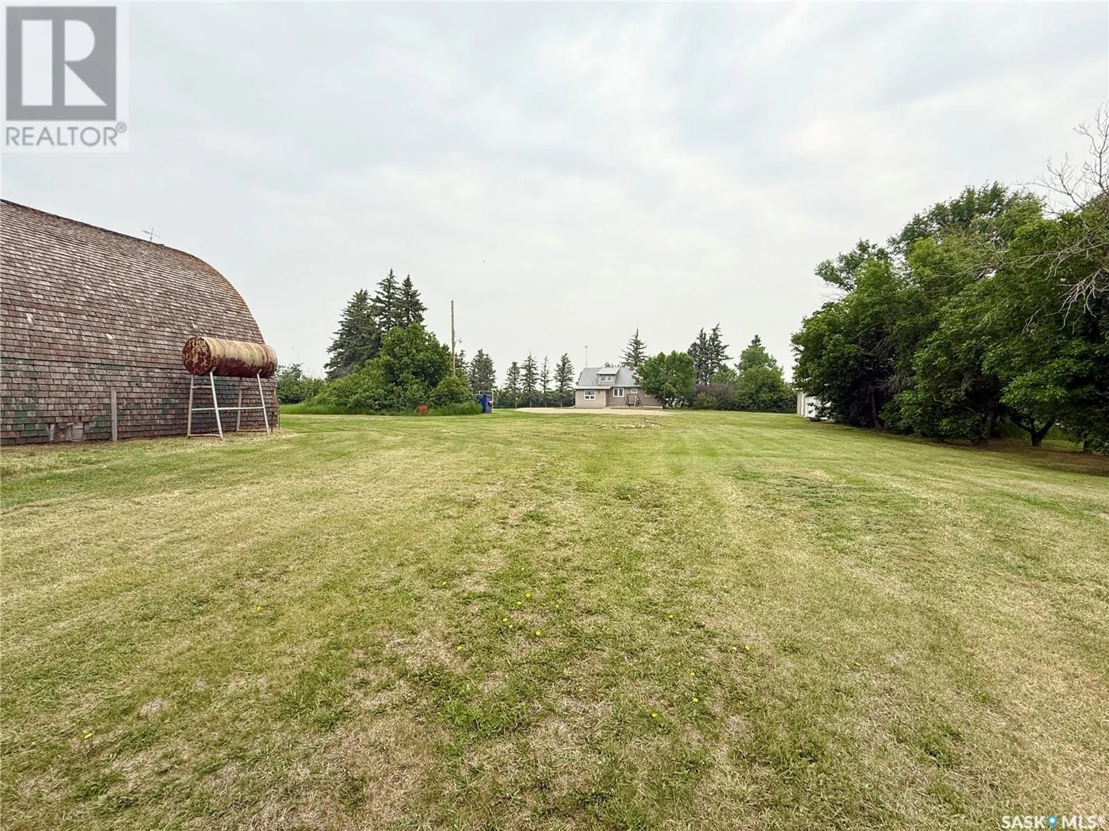 A pic from outside/outdoor area/front of a property/back of a property/a pic from drone, unknown for WEYBURN ACREAGE, Weyburn Rm No. 67 Saskatchewan S4H2K1