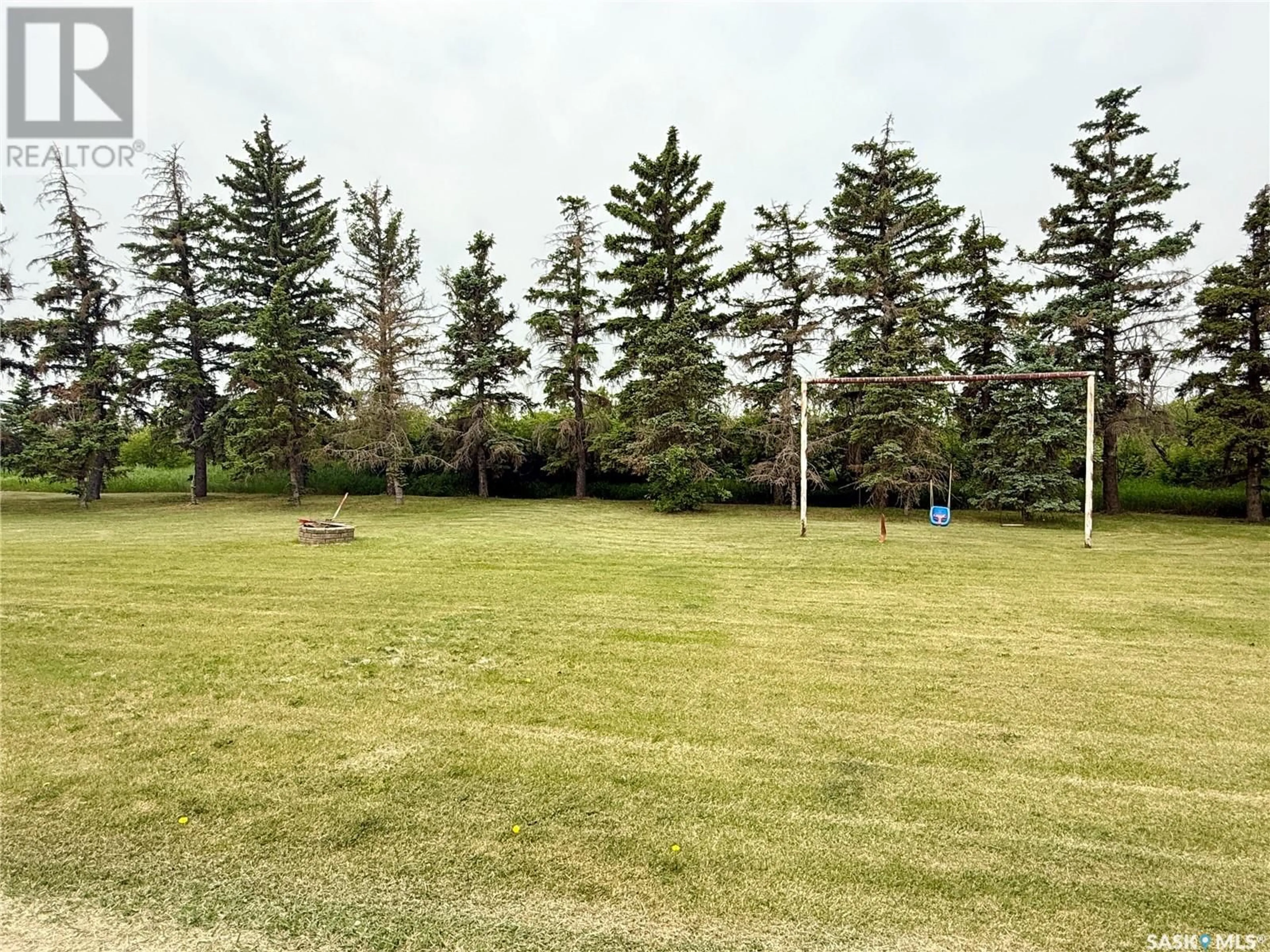 A pic from outside/outdoor area/front of a property/back of a property/a pic from drone, forest/trees view for WEYBURN ACREAGE, Weyburn Rm No. 67 Saskatchewan S4H2K1