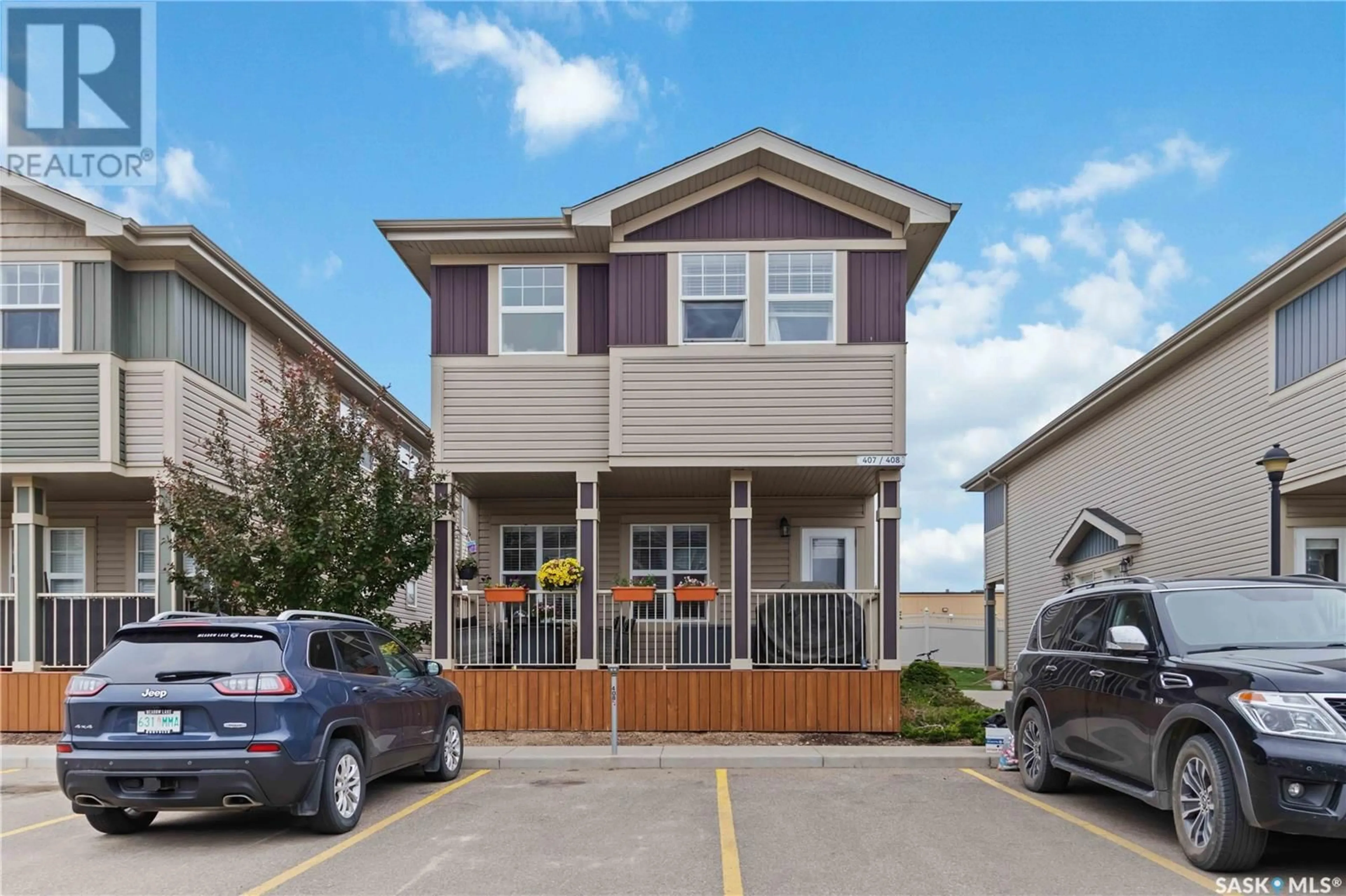 Home with vinyl exterior material, street for 407 100 CHAPARRAL BOULEVARD, Martensville Saskatchewan S0K0A2