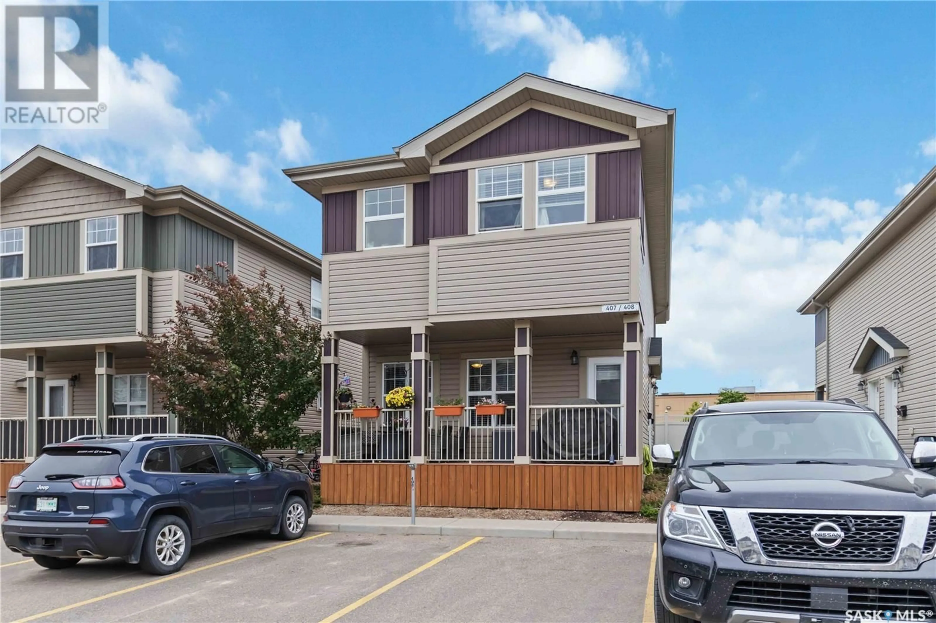 Home with vinyl exterior material, street for 407 100 CHAPARRAL BOULEVARD, Martensville Saskatchewan S0K0A2