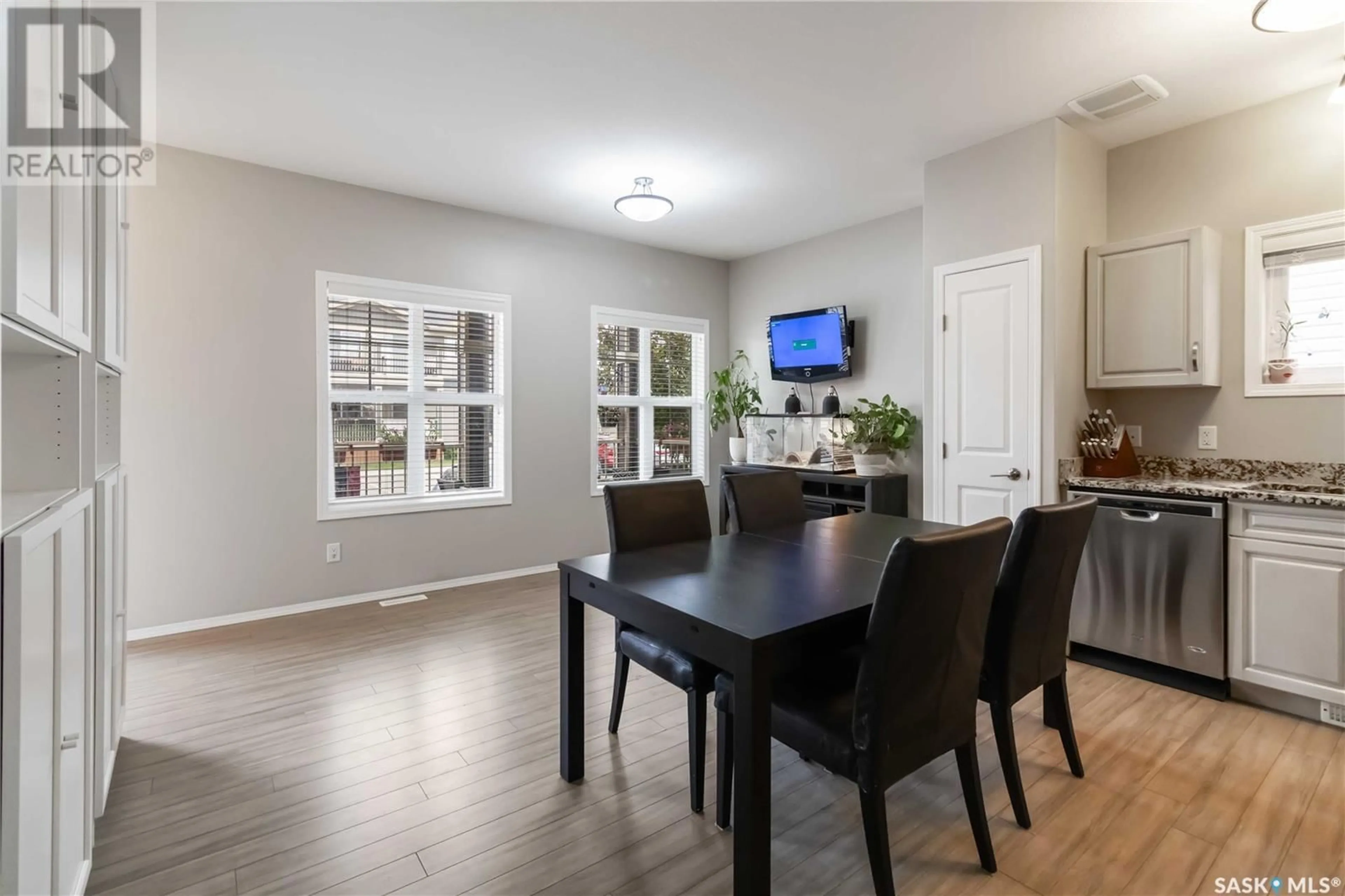 Dining room, wood/laminate floor for 407 100 CHAPARRAL BOULEVARD, Martensville Saskatchewan S0K0A2