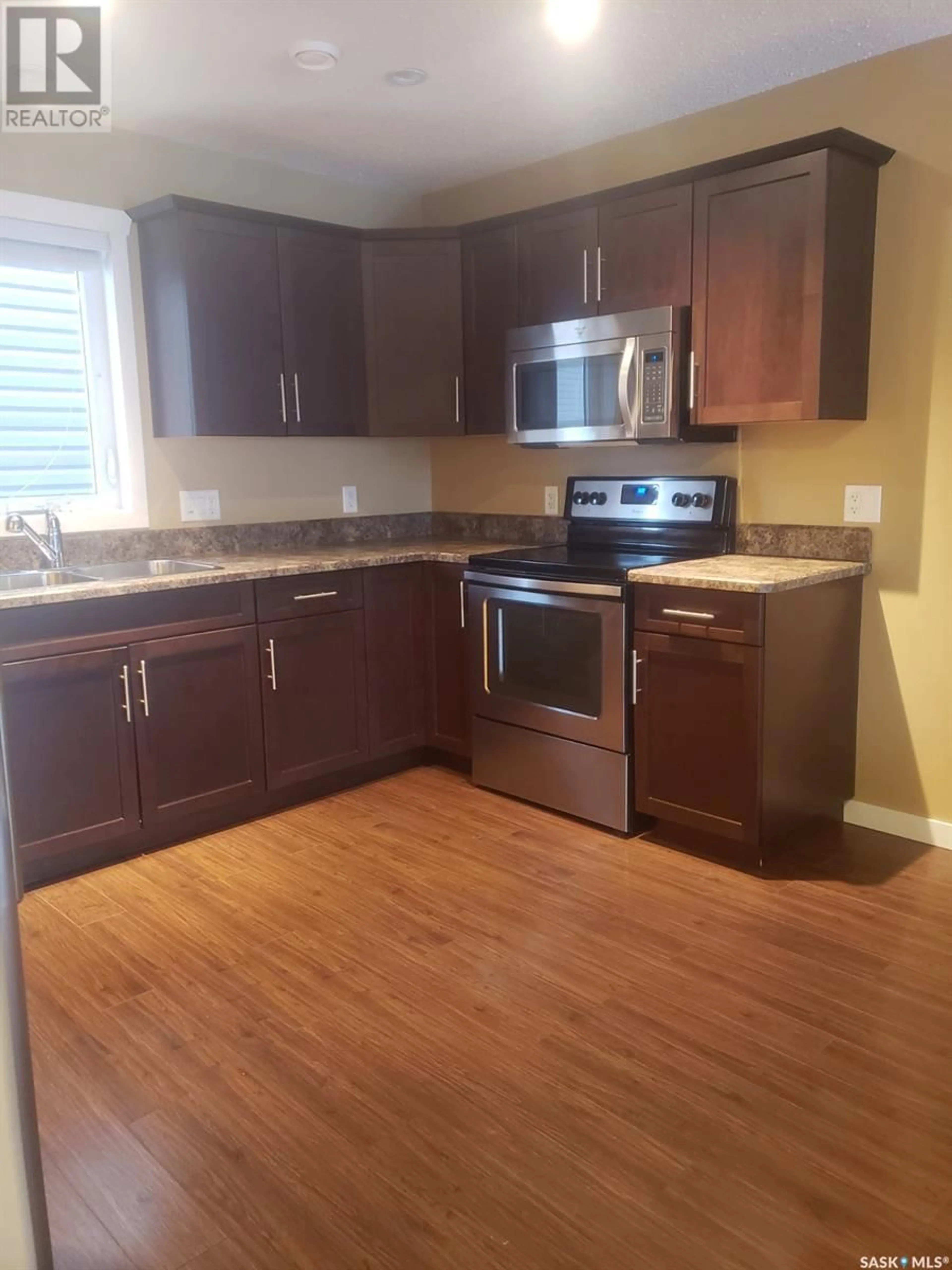 Standard kitchen, wood/laminate floor for 4 - 1237 THIRD STREET, Estevan Saskatchewan S4A0R8