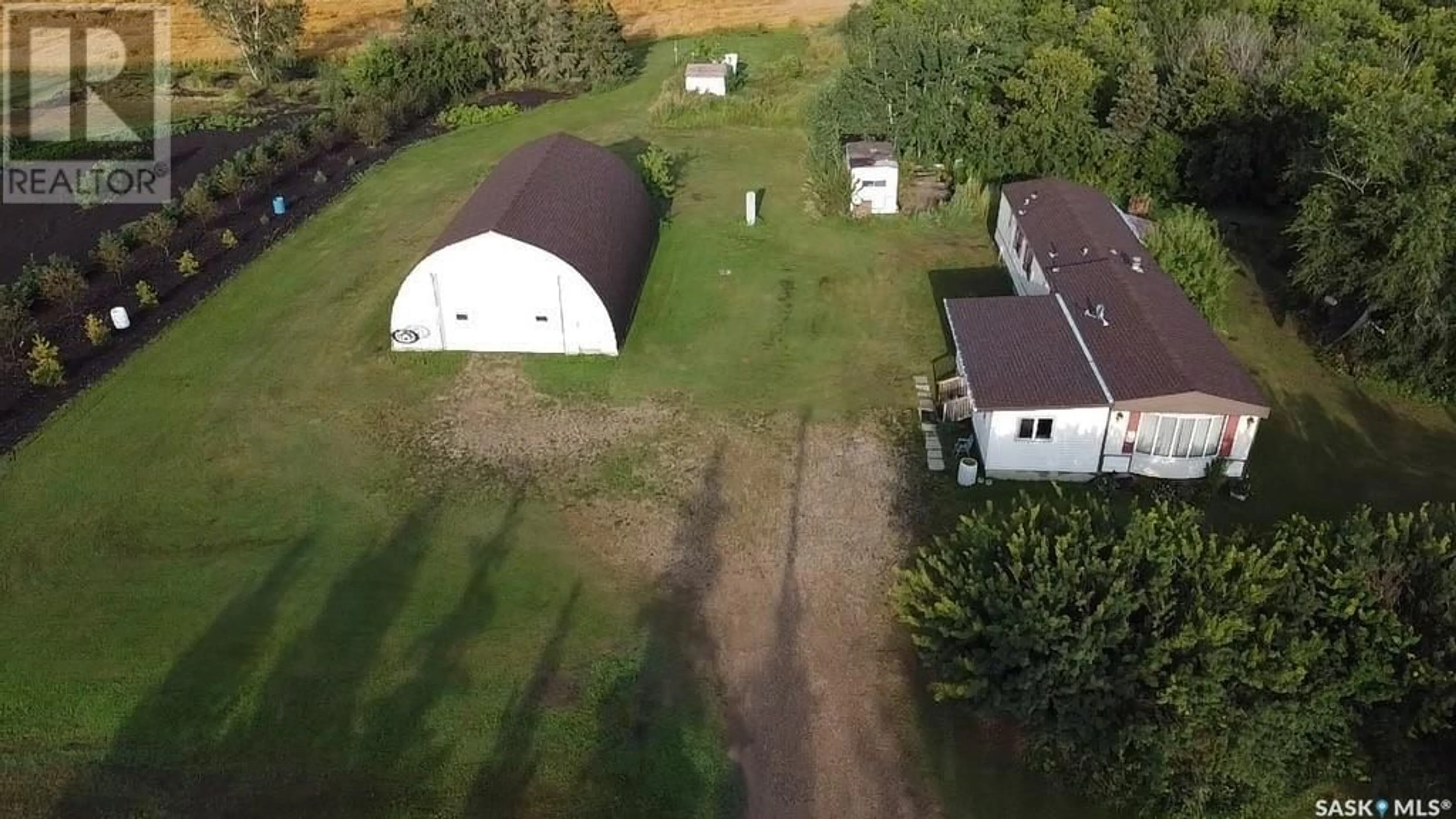 A pic from outside/outdoor area/front of a property/back of a property/a pic from drone, building for HAGEN ACREAGE, Birch Hills Rm No. 460 Saskatchewan S0J1B0