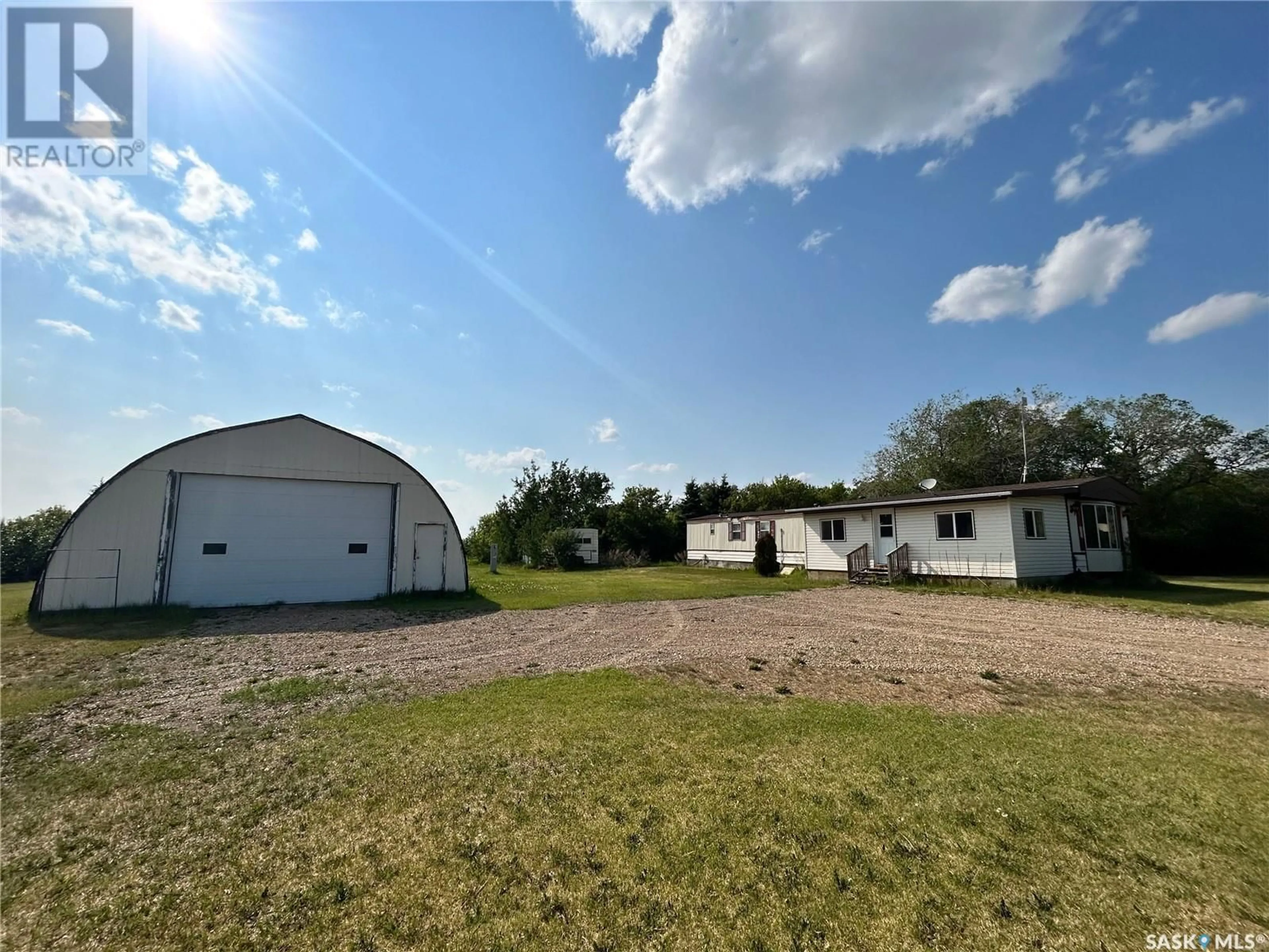 A pic from outside/outdoor area/front of a property/back of a property/a pic from drone, building for HAGEN ACREAGE, Birch Hills Rm No. 460 Saskatchewan S0J1B0