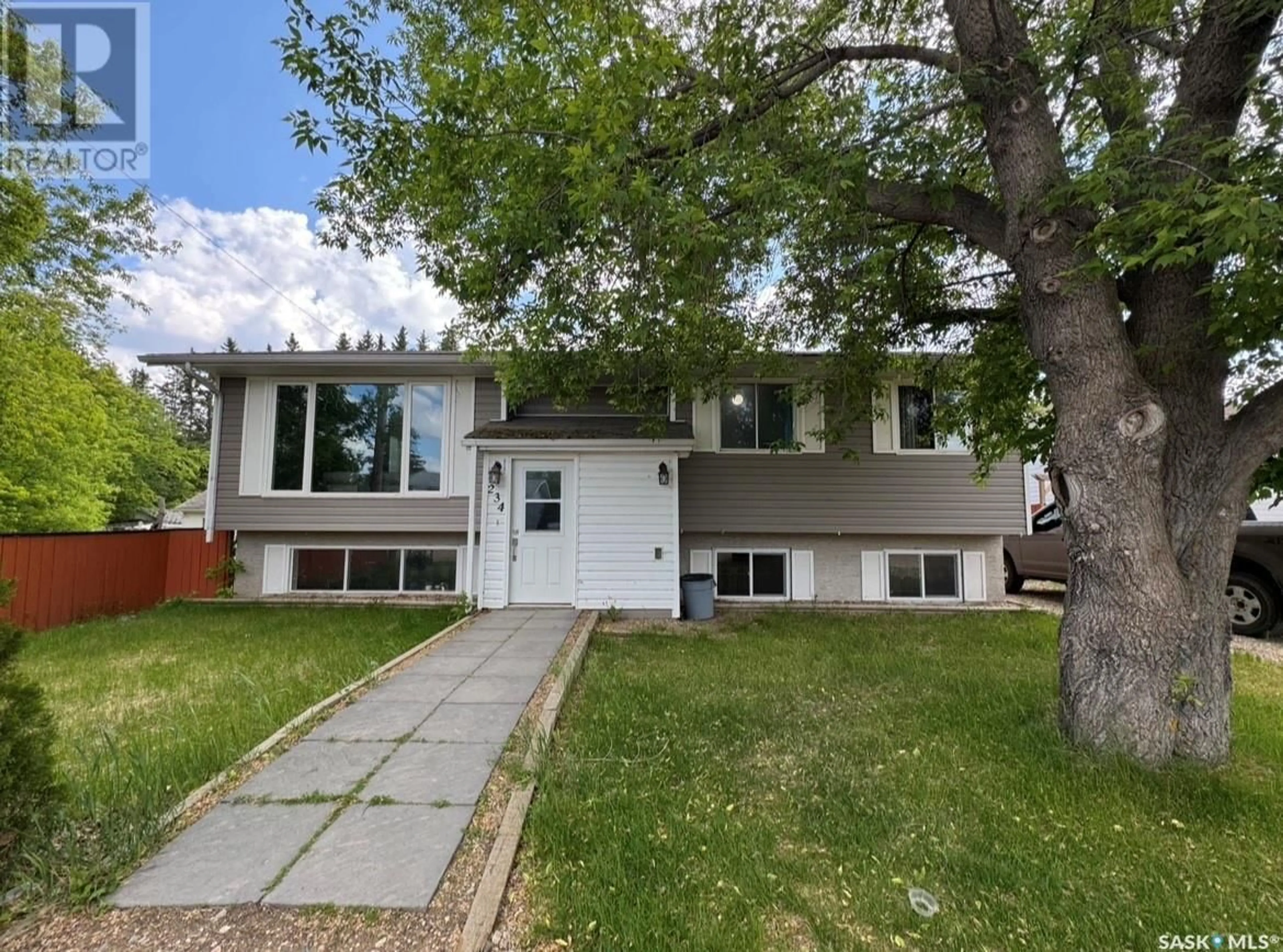 Home with vinyl exterior material, street for 234 1A AVENUE, St. Walburg Saskatchewan S0M2T0