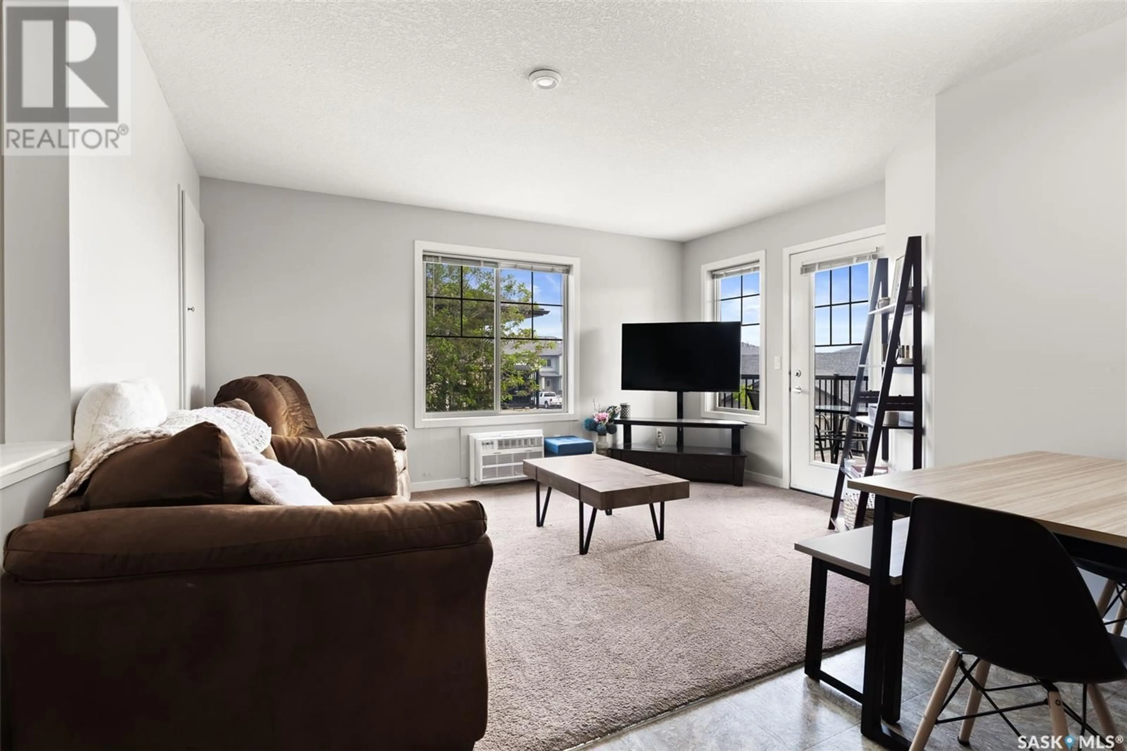 Living room with furniture, unknown for 5031 - 55 JAMES HILL ROAD, Regina Saskatchewan S4W0B9