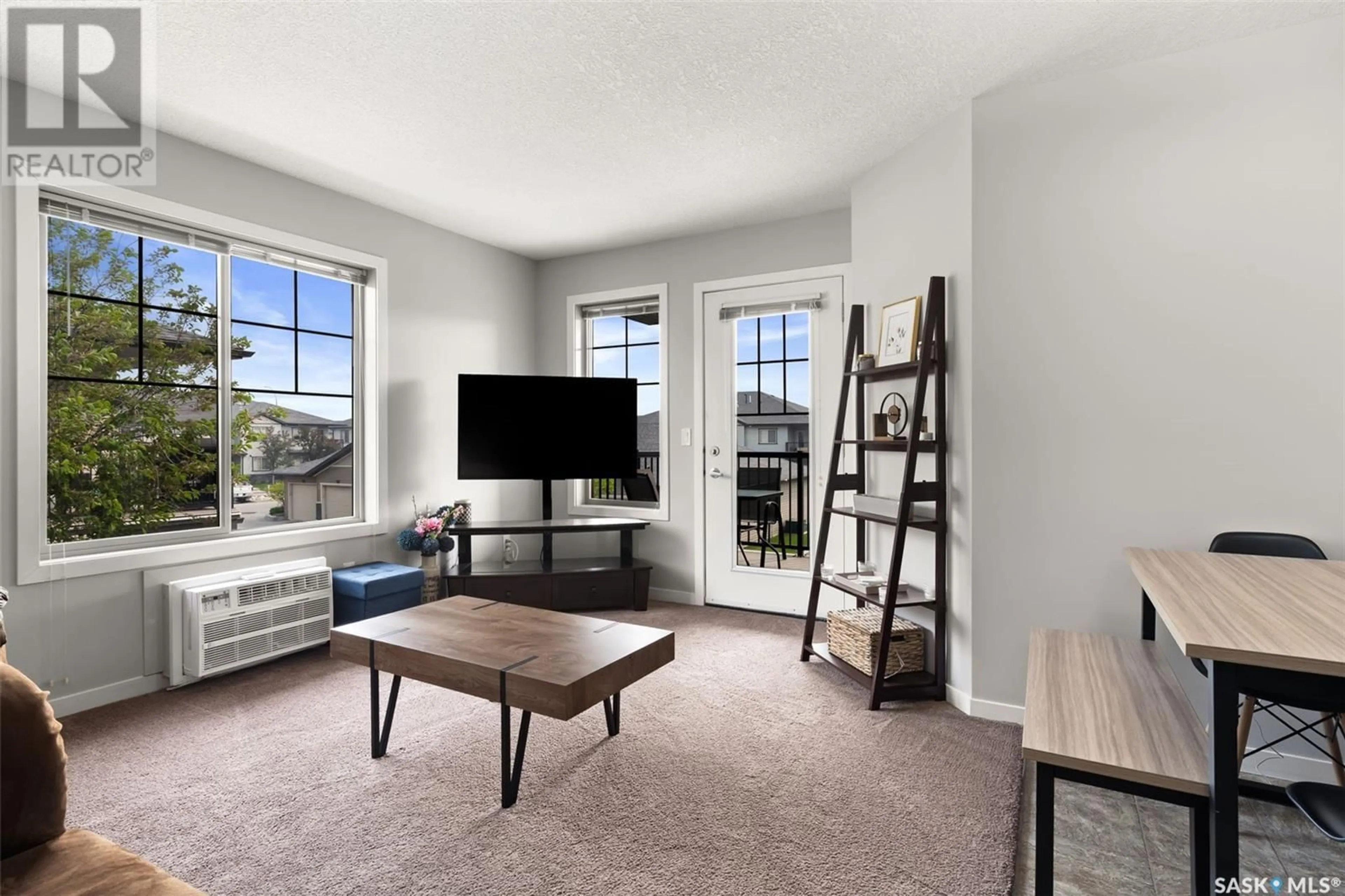 Living room with furniture, unknown for 5031 - 55 JAMES HILL ROAD, Regina Saskatchewan S4W0B9