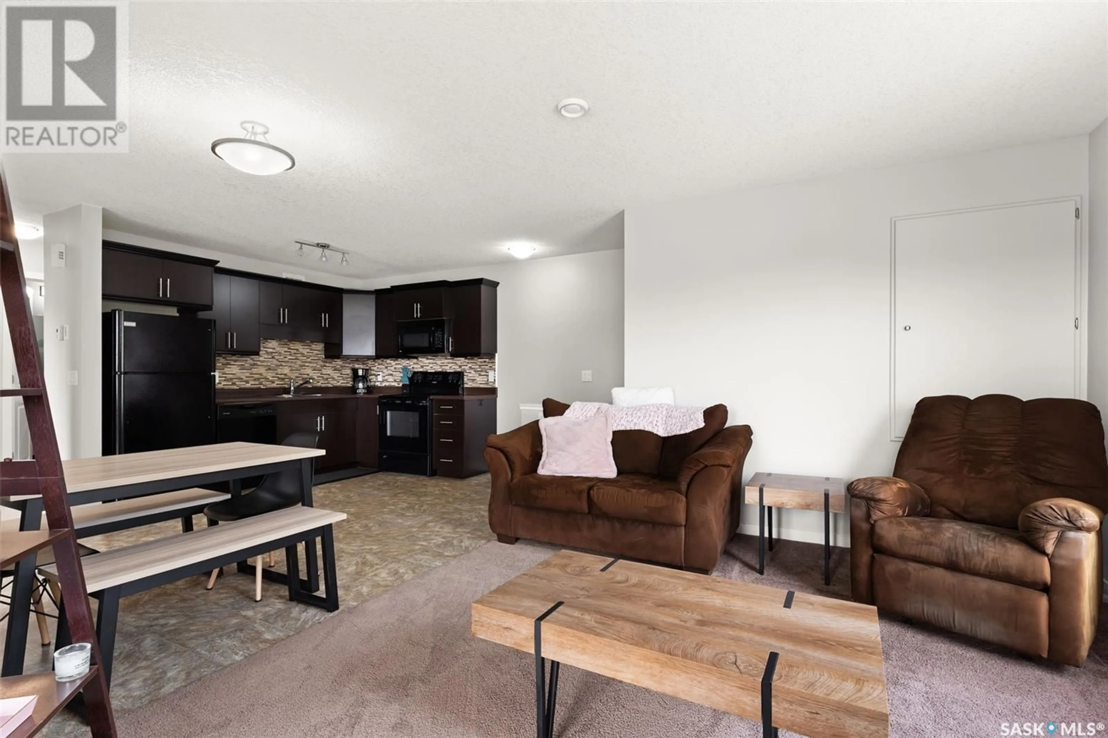 Living room with furniture, unknown for 5031 - 55 JAMES HILL ROAD, Regina Saskatchewan S4W0B9