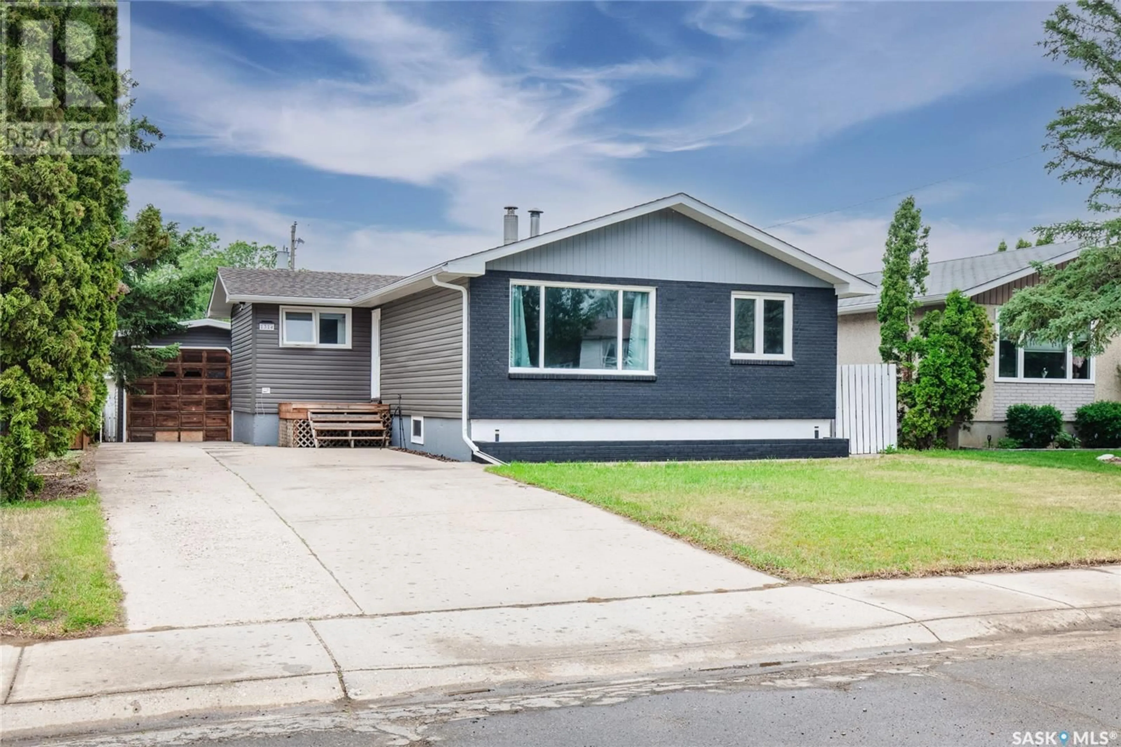 Home with vinyl exterior material, street for 1314 GRANDVIEW STREET, Moose Jaw Saskatchewan S6H6H8