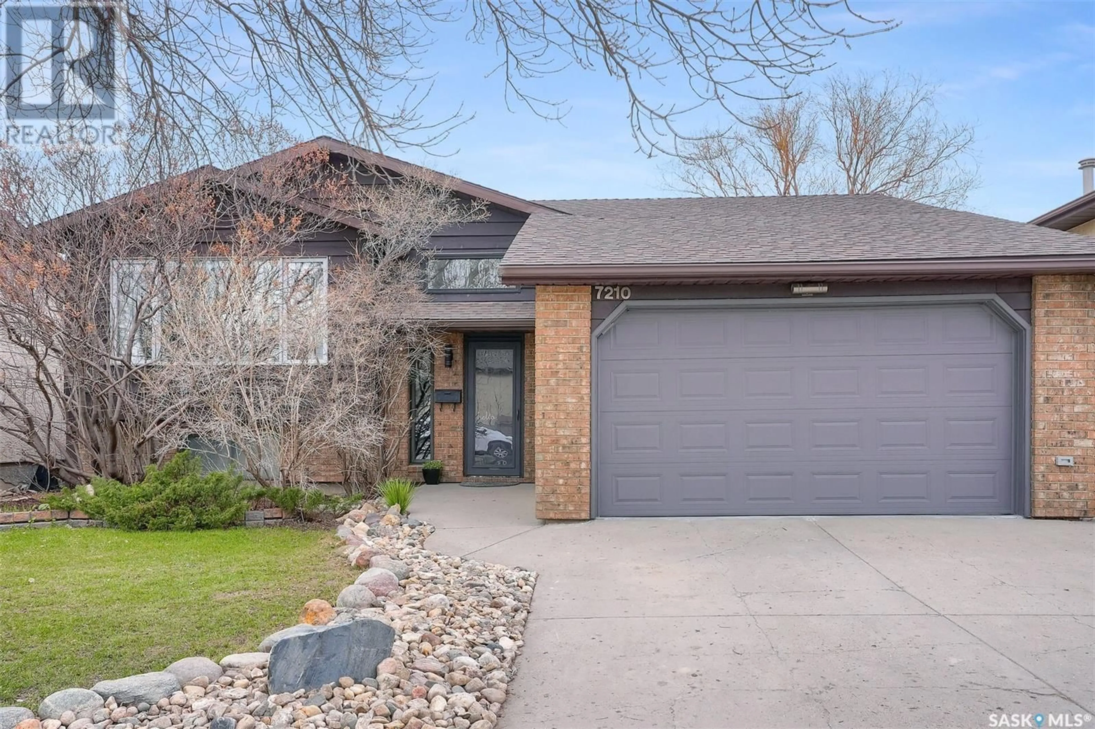 Home with brick exterior material, street for 7210 WHELAN DRIVE, Regina Saskatchewan S4X3W7