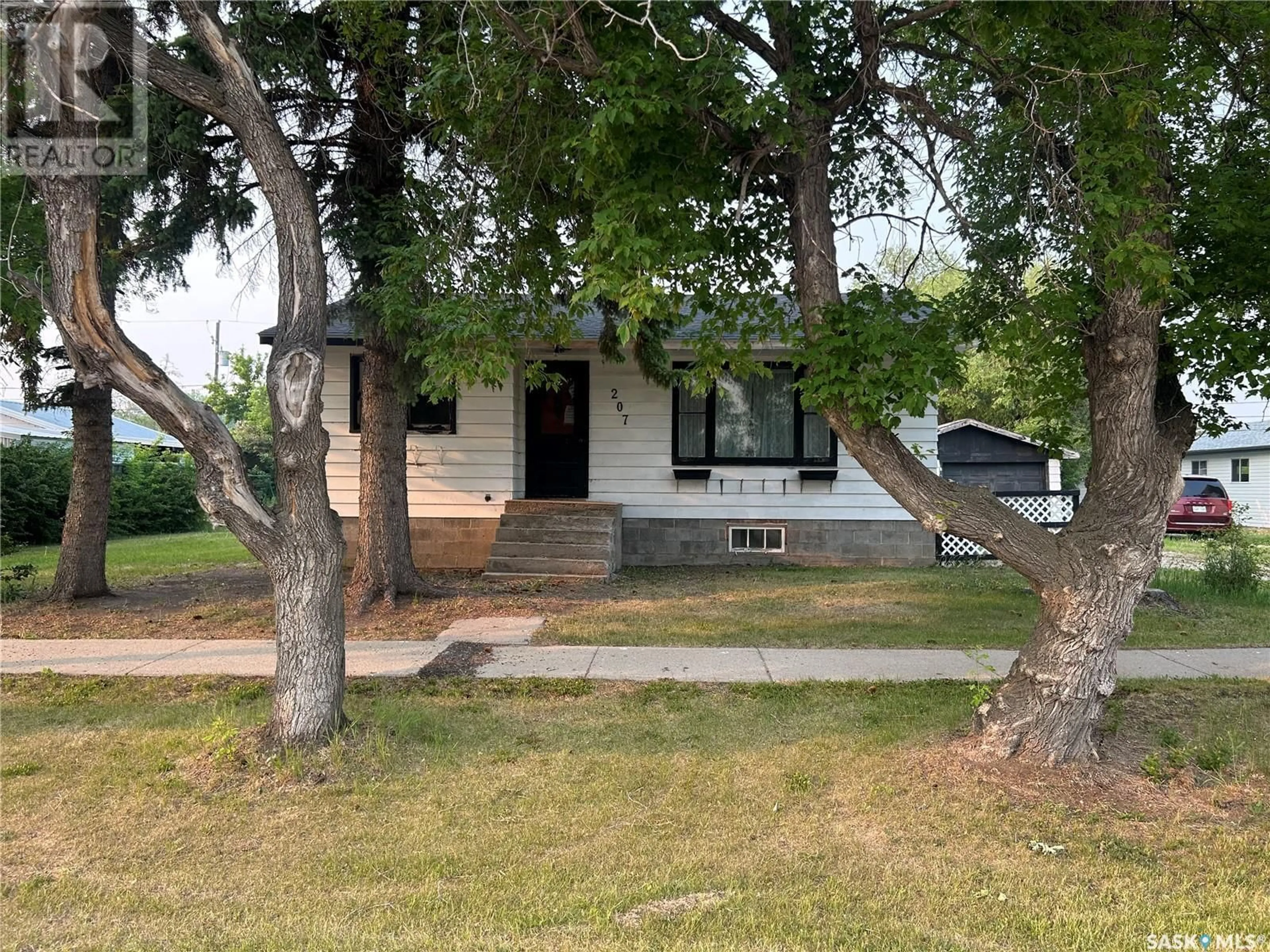 A pic from outside/outdoor area/front of a property/back of a property/a pic from drone, street for 207 3RD AVENUE, Nokomis Saskatchewan S0G3R0