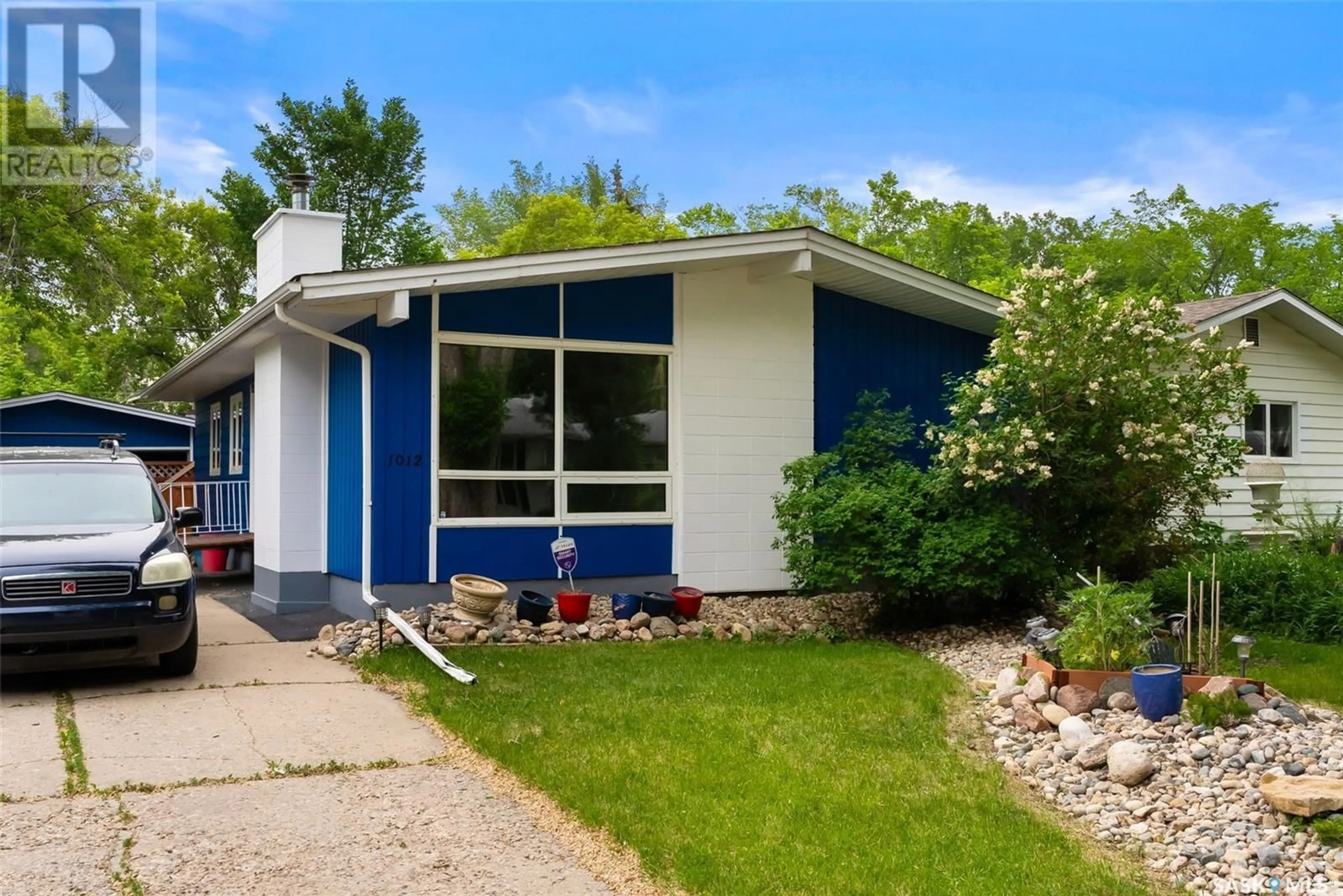 Home with vinyl exterior material, street for 1012 SHANNON ROAD, Regina Saskatchewan S4S5K5