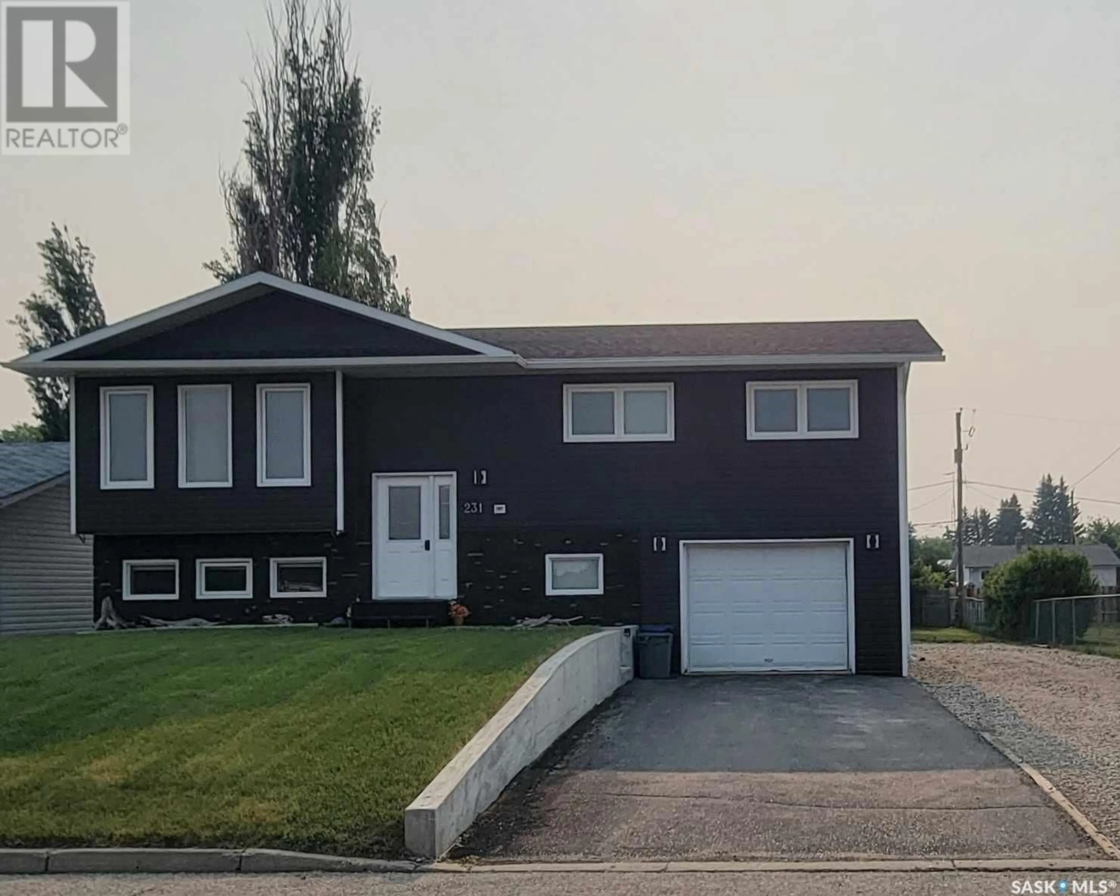 Home with vinyl exterior material, street for 231 4TH STREET, Preeceville Saskatchewan S0A3B0
