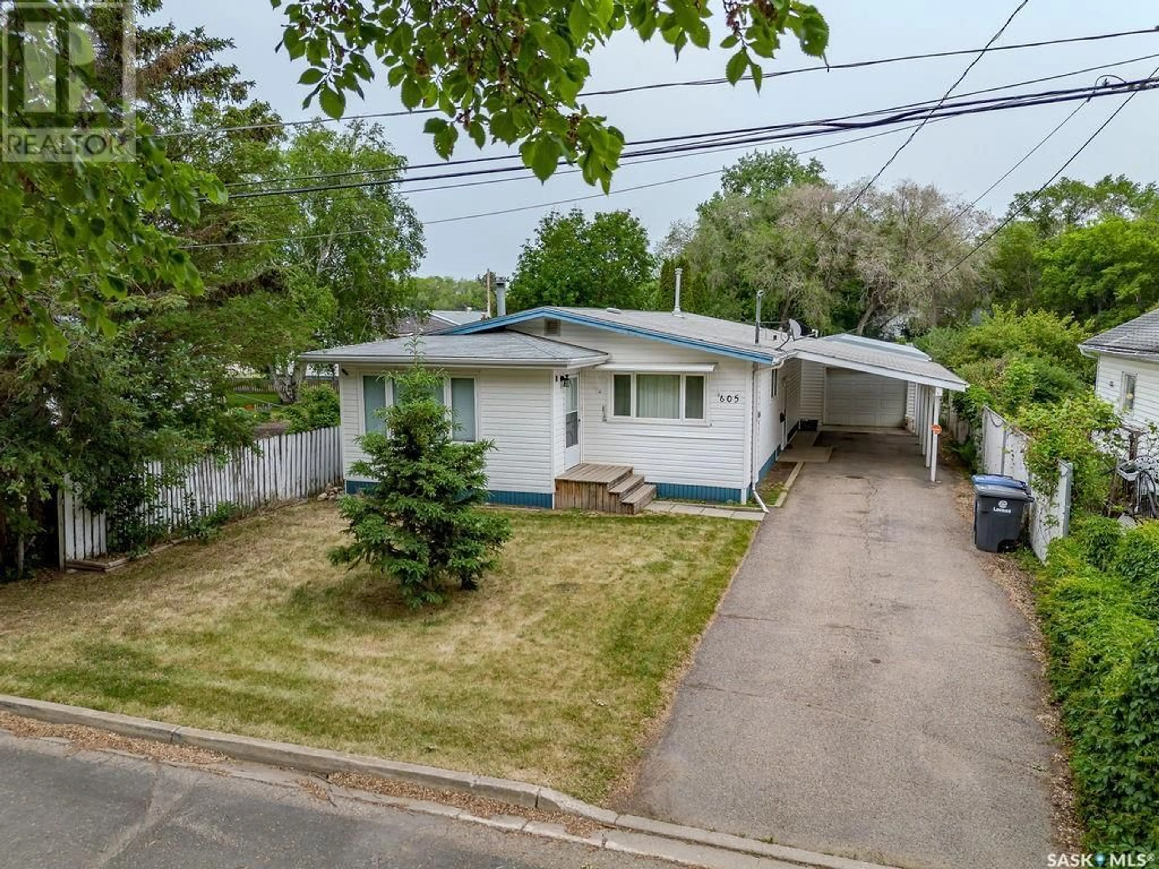 A pic from outside/outdoor area/front of a property/back of a property/a pic from drone, street for 605 5TH AVENUE, Rosthern Saskatchewan S0K3R0
