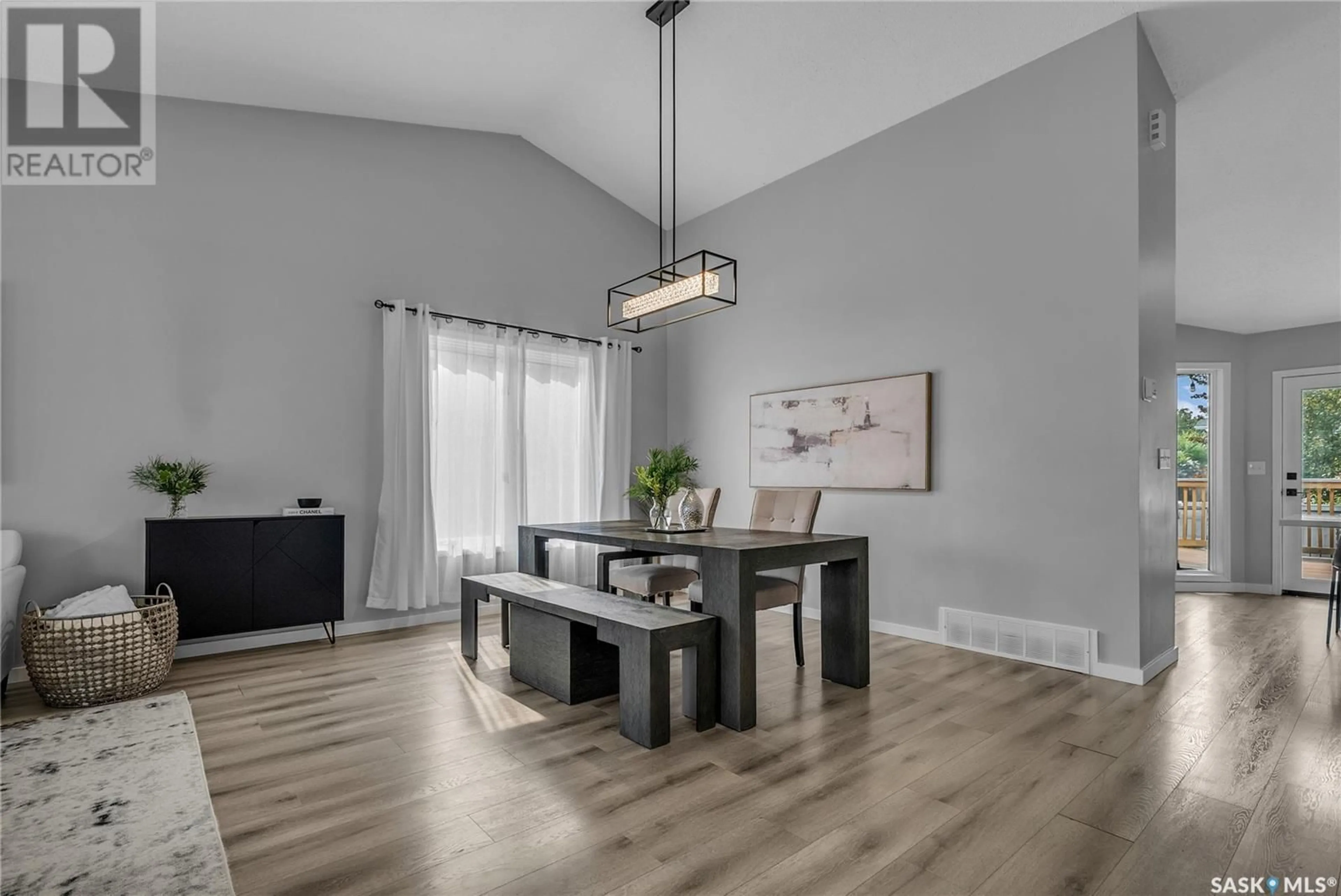 Dining room, wood/laminate floor for 250 EMMELINE ROAD, Saskatoon Saskatchewan S7J5B7