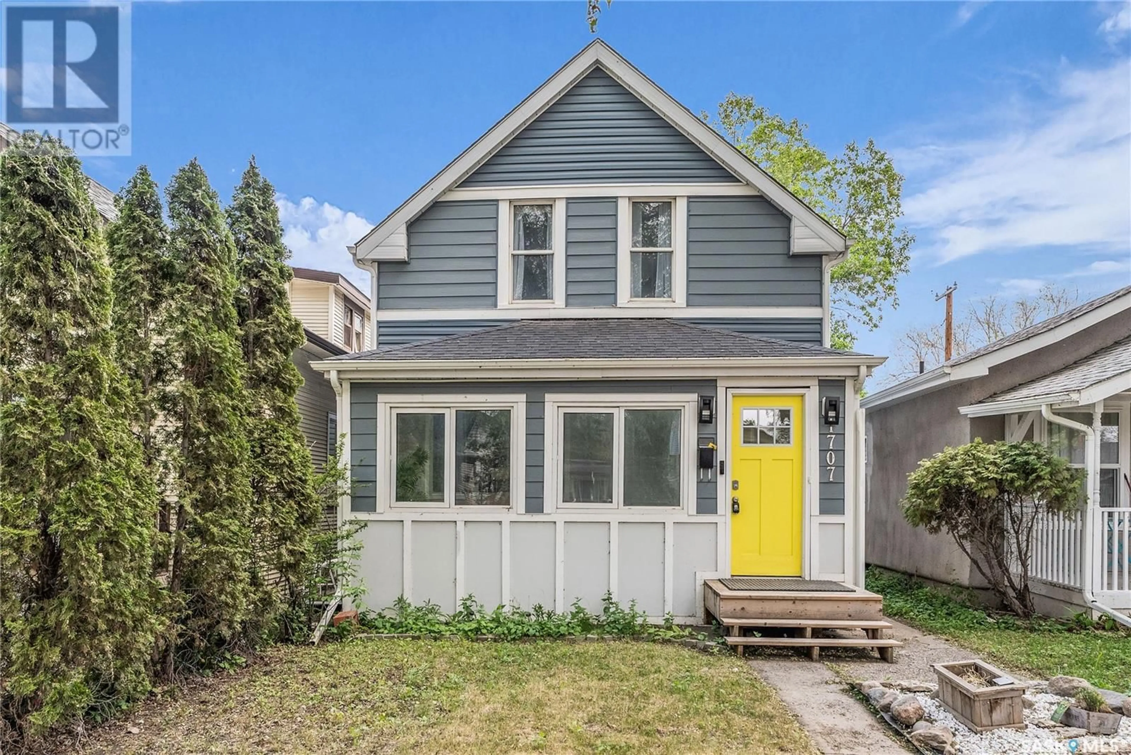 Home with vinyl exterior material, street for 1707 LORNE AVENUE, Saskatoon Saskatchewan S7H1Y3